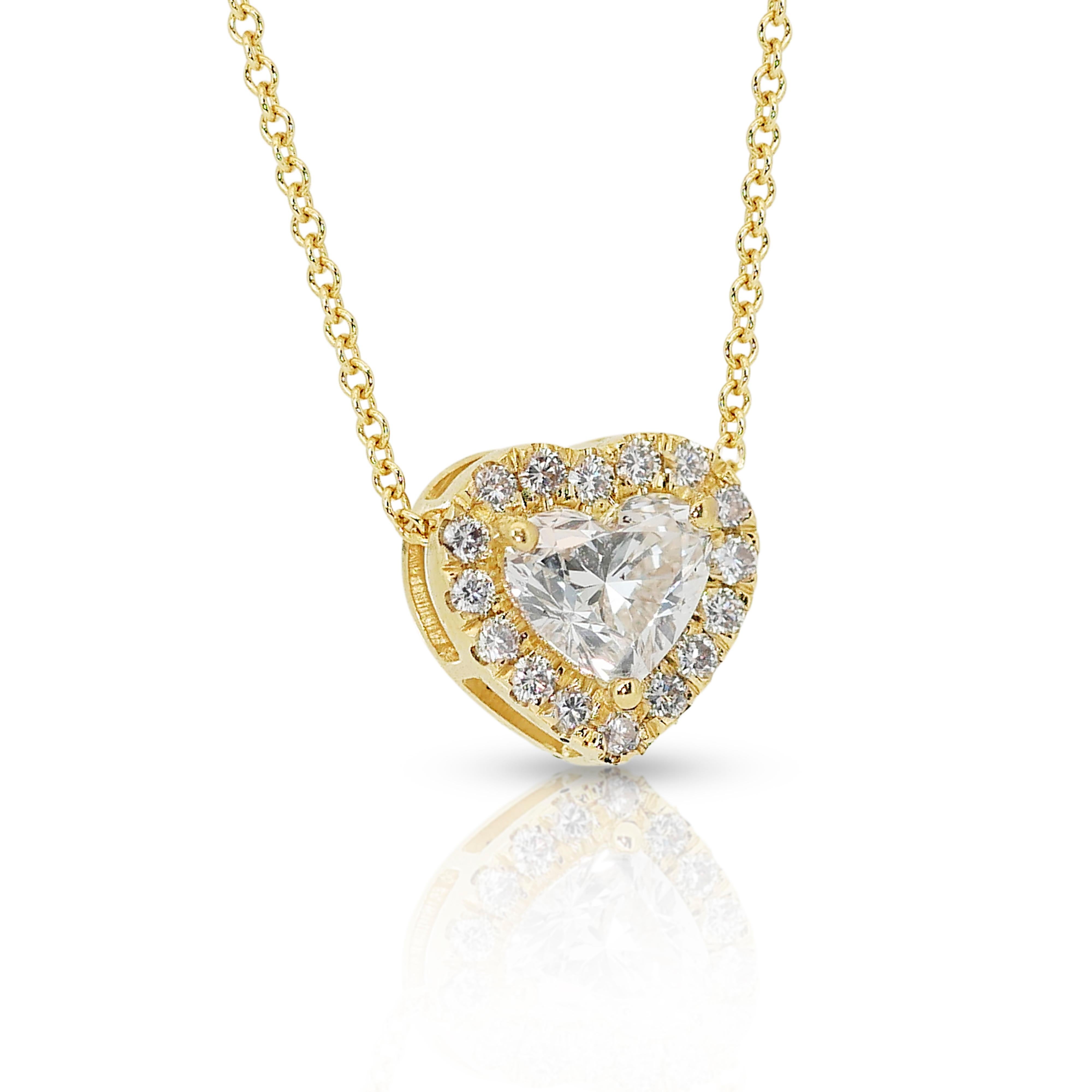 Brilliant 1.28ct Diamonds Halo Necklace in 18k Yellow Gold - IGI Certified

Unveil the essence of love with this captivating 18k yellow gold halo necklace, featuring a 1.03-carat heart-shaped diamond that symbolizes romance and affection. Adding to