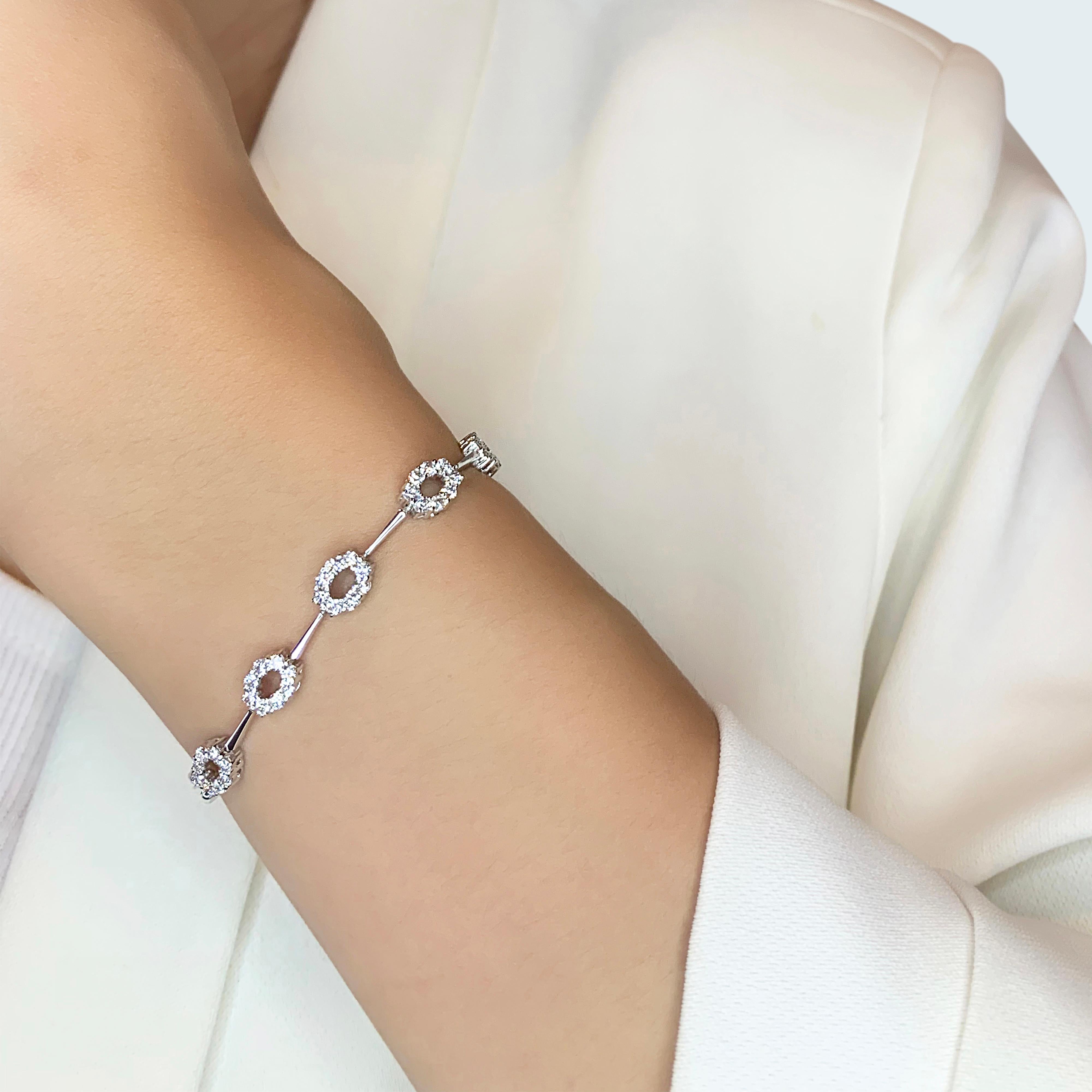 Elevate your style with this sophisticated 18K White Gold bracelet, featuring 40 round brilliant natural diamonds with a total carat weight of 1.2ct. Each diamond exhibits a stunning G color grade and VS clarity, ensuring exceptional brilliance and
