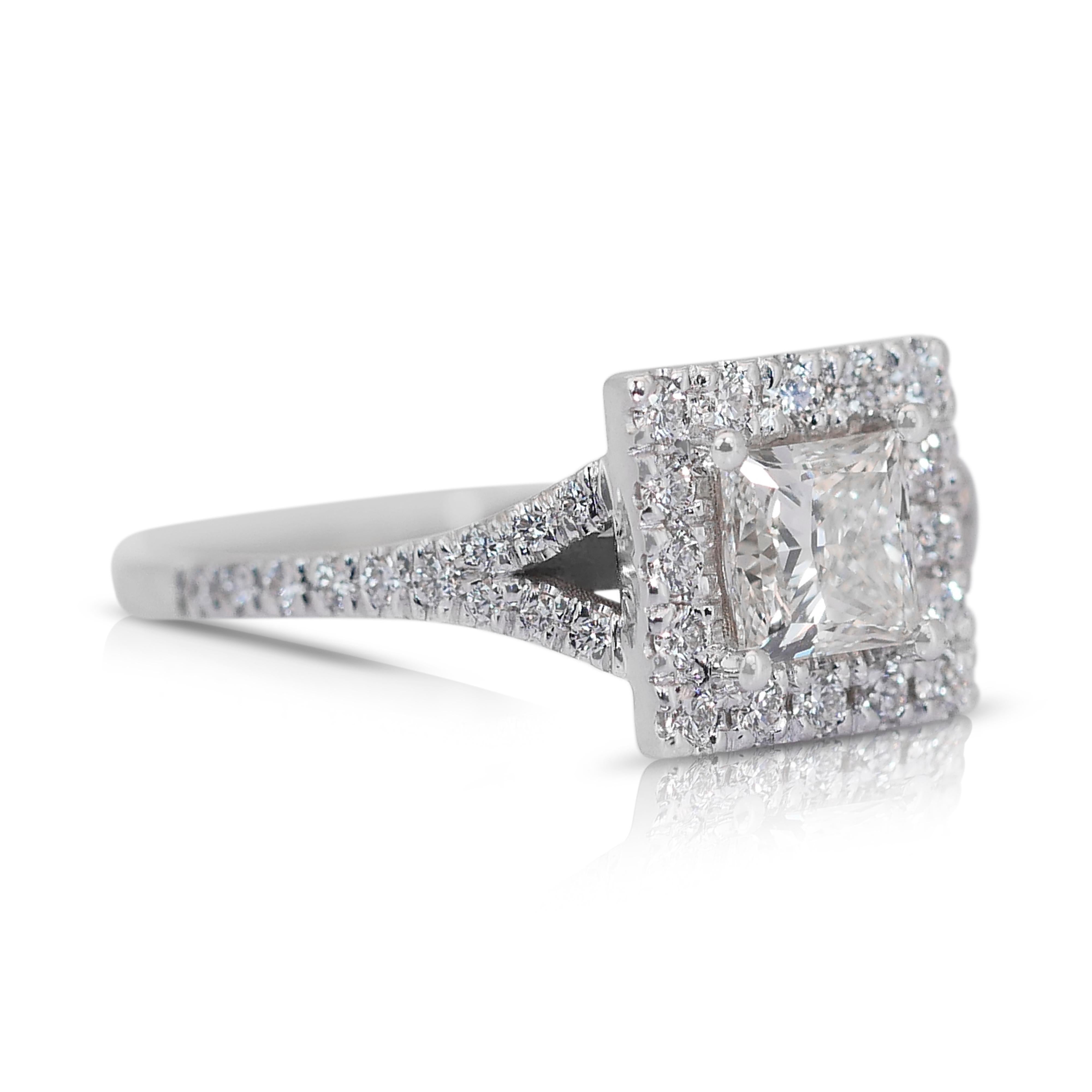 Brilliant 1.36ct Diamonds Halo Ring in 18k White Gold - GIA Certified

Unveil the brilliance of this sophisticated diamond cluster ring, a masterpiece in 18k white gold. The centerpiece is a 1.01-carat square-cut diamond with a stunning color grade