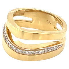 Anillo brillante de oro de 18 quilates con diamantes en forma de ola