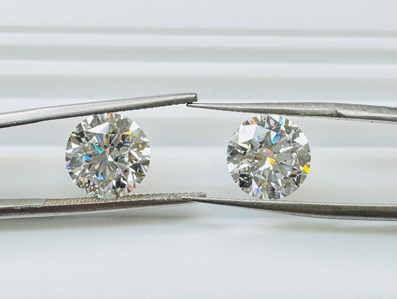 Brilliant 8.26ct Pair of Round-Shaped Diamonds - GIA Certified Unisexe en vente