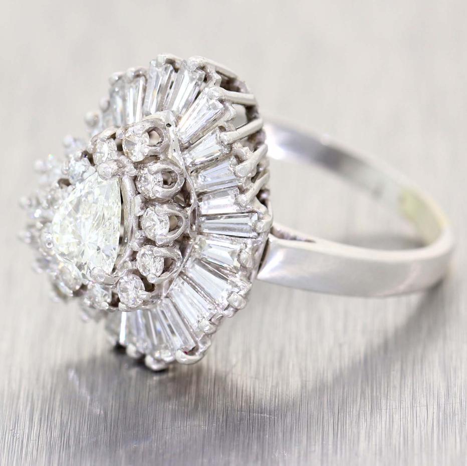Stunning Platinum 2.00 carat F/G VS Pear Baguette Round Cut Diamond Cluster Ring. 

This gorgeous super white and fiery diamond ballerina ring is by the amazing company Palais who made the very famous and rare 