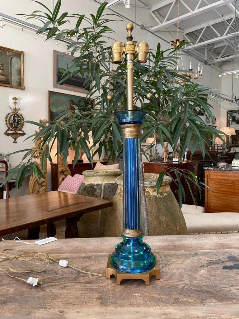 Mid-century Murano lamp by Marbro Lamp Co.c. 1960, of highest quality,  in rich blue, the column mounted on a brass base.

21” h. from bottom of the base to the top of the glass; 30” from bottom of base to top of brass finial.

