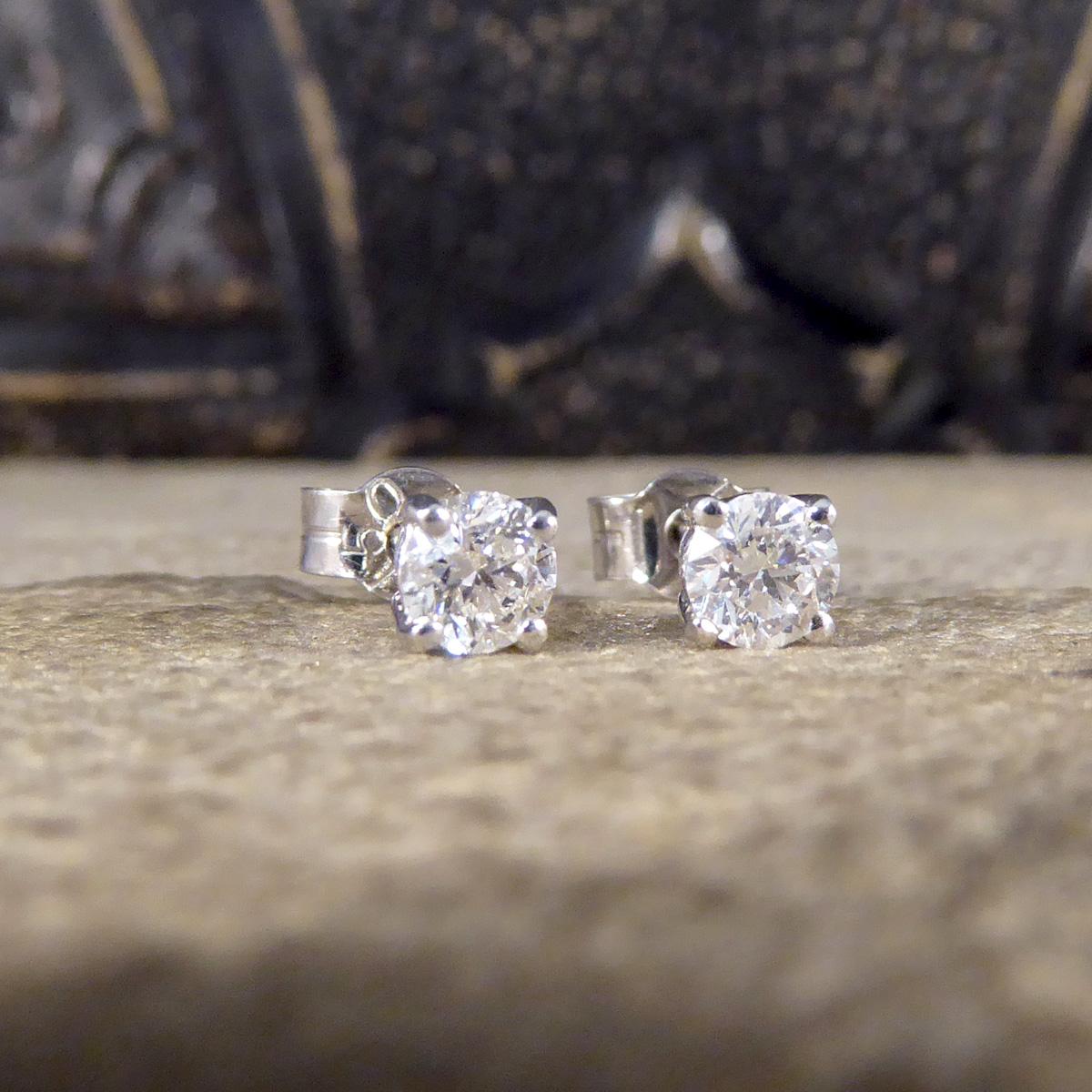 The perfect pair of stud earrings for everyday wear. Each stud is set with a Round Brilliant Cut Diamond, matching well in colour and clarity and weighing a total of 0.53ct. Each Diamond sits in a White Gold basket four claw setting, allowing lots