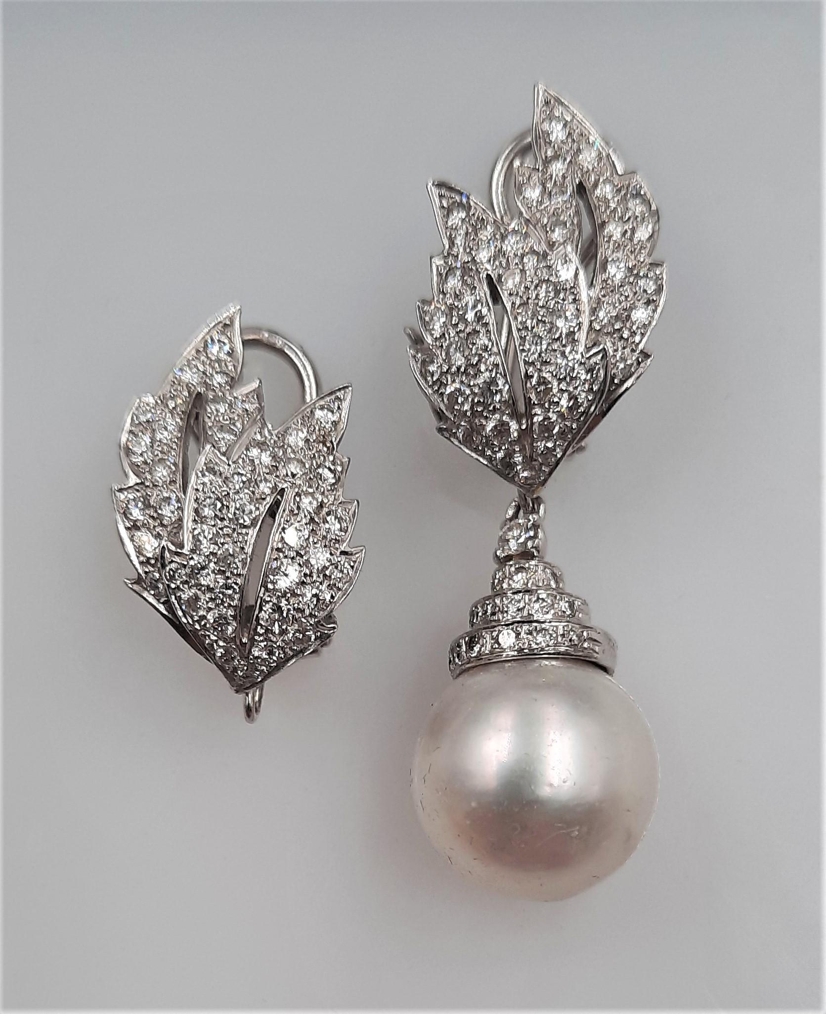 Very elegant brilliant cut diamond (1.95 carats), Australian sea pearl (34.73 carats), 18 carats white gold (12.9 grams) drop earrings. Is it possible to wear the earrings without drops, or change the drop with other drop (amber, turquoise, quartz,