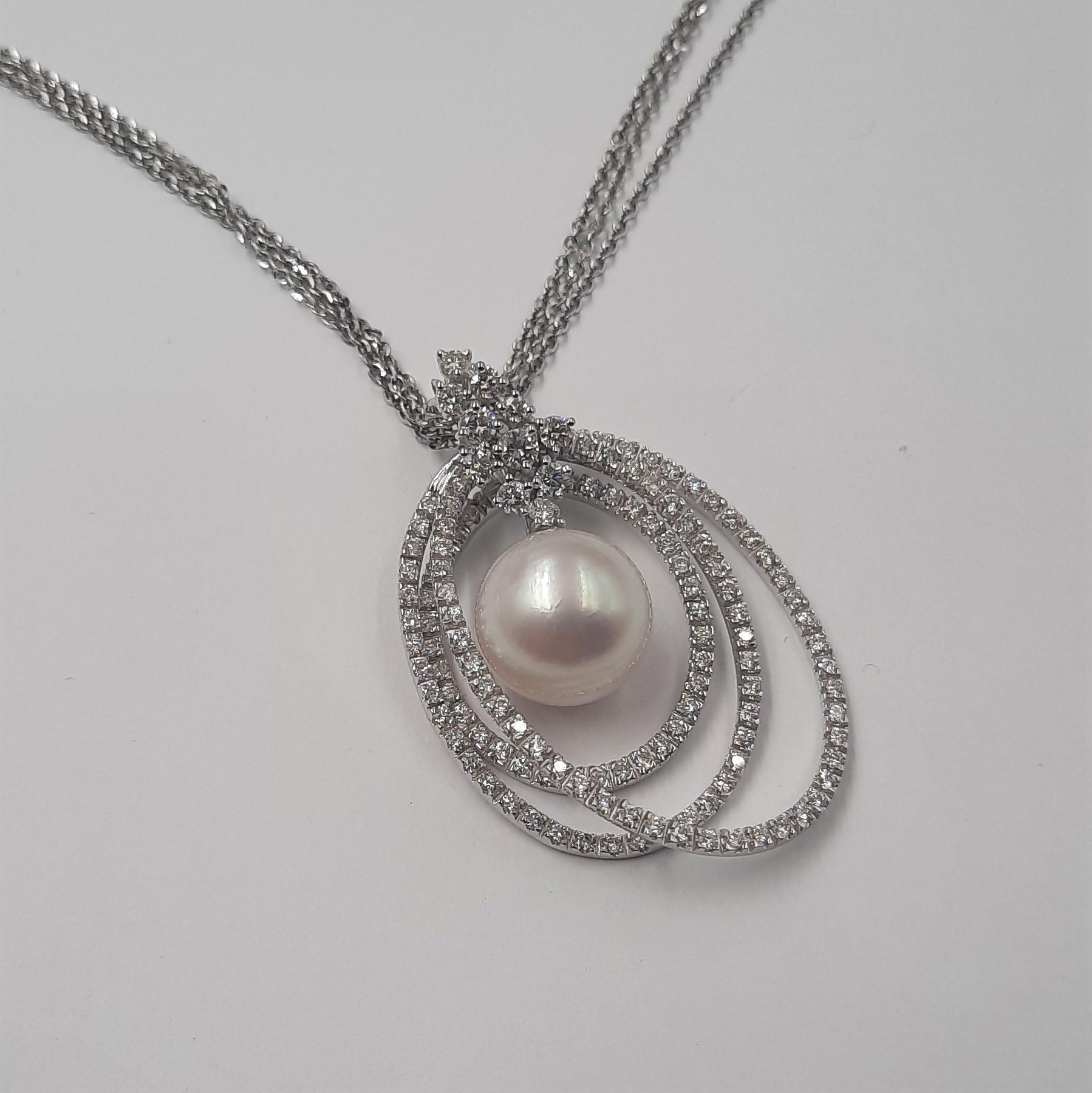 Beautiful Italian brilliant cut diamond (2.57 carats), Australian sea pearl (20.62 carats) and 18 carats white gold (18.8 grams) pendan twith chain. The pendant is eventually part of a set with earrings (see). 