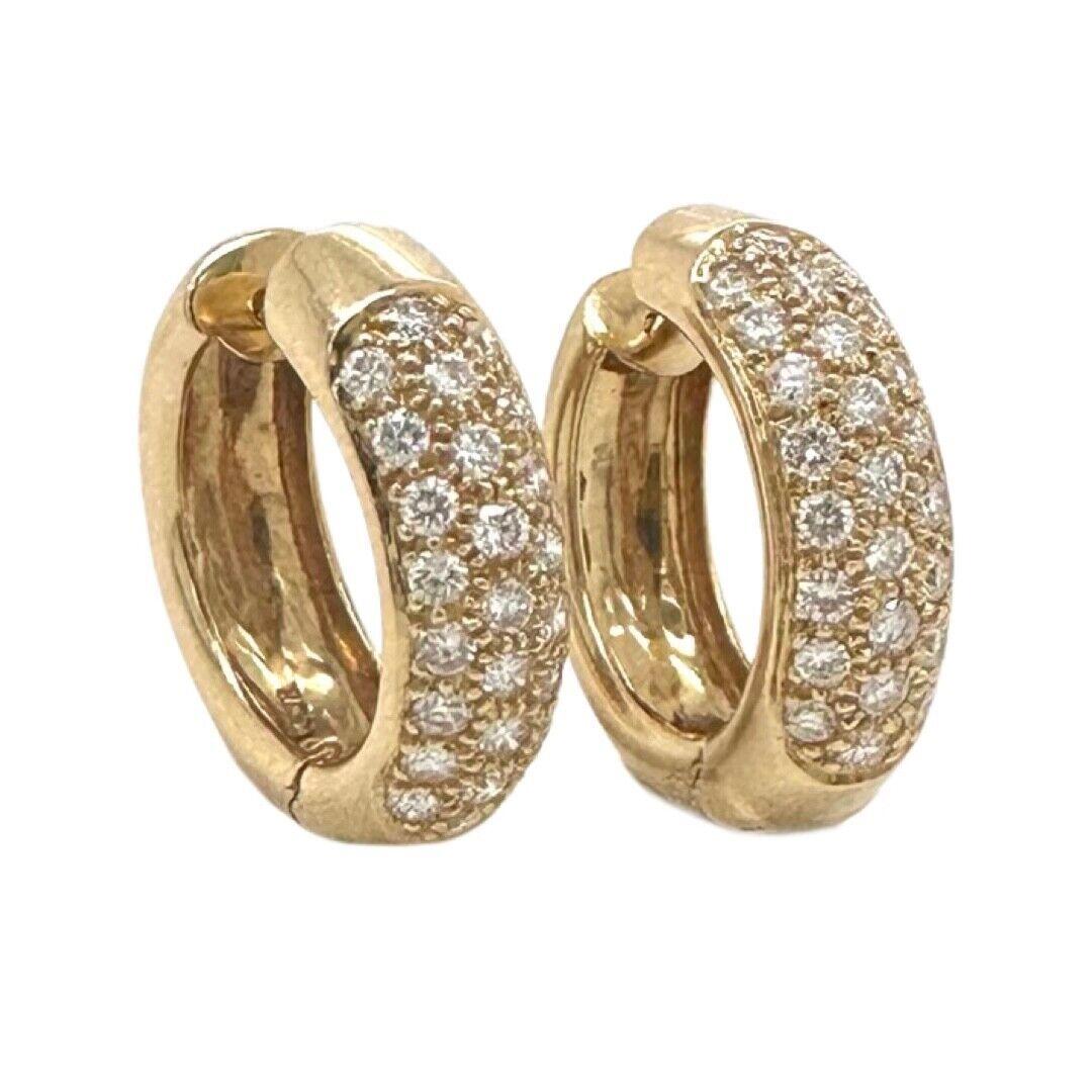 Style: Hoop Huggie Earrings

Metal: Yellow Gold

Metal Purity: 18k

Stones: 50 Round Diamonds (25 each hoop)

Diamond Carat Weight: approx. 0.5ct

Diamond Clarity: VS1 - VS2

Diamond Color: G - H

Hoop Length: 2 cm

Hoop Width: 2 cm

Total Weight