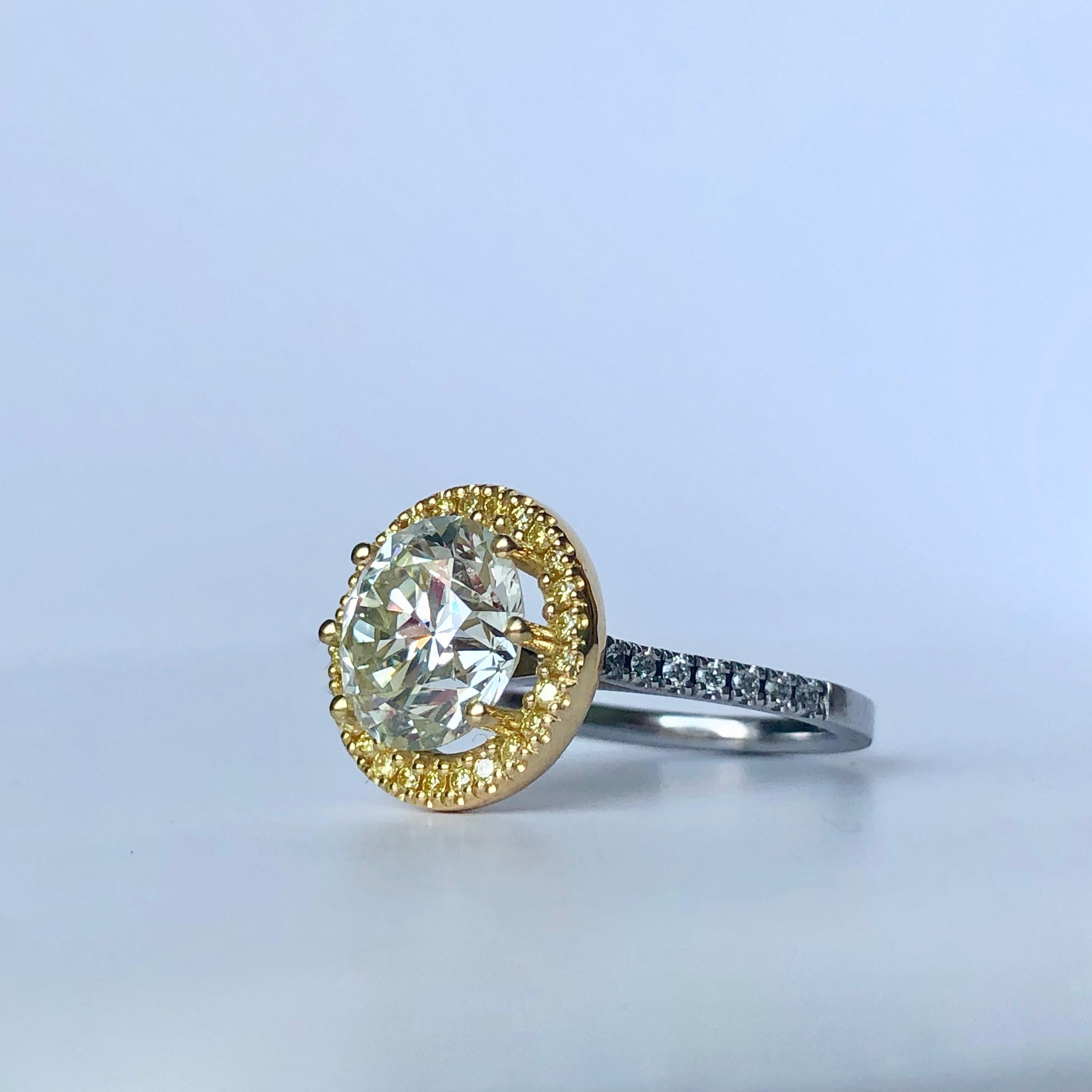 Round Cut Diamond In Fancy Yellow Diamond Halo

Bi Colour 18k Gold 

Total Carat Weight 4.10ct 

Principal Diamond 3.80ct M/N colour - VS Clarity 
A very clean and lively diamond

available any ring size

Videos available 

This is a diamond from a