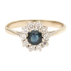 Retro Sapphire and Brilliant Cut Diamond Cluster Ring