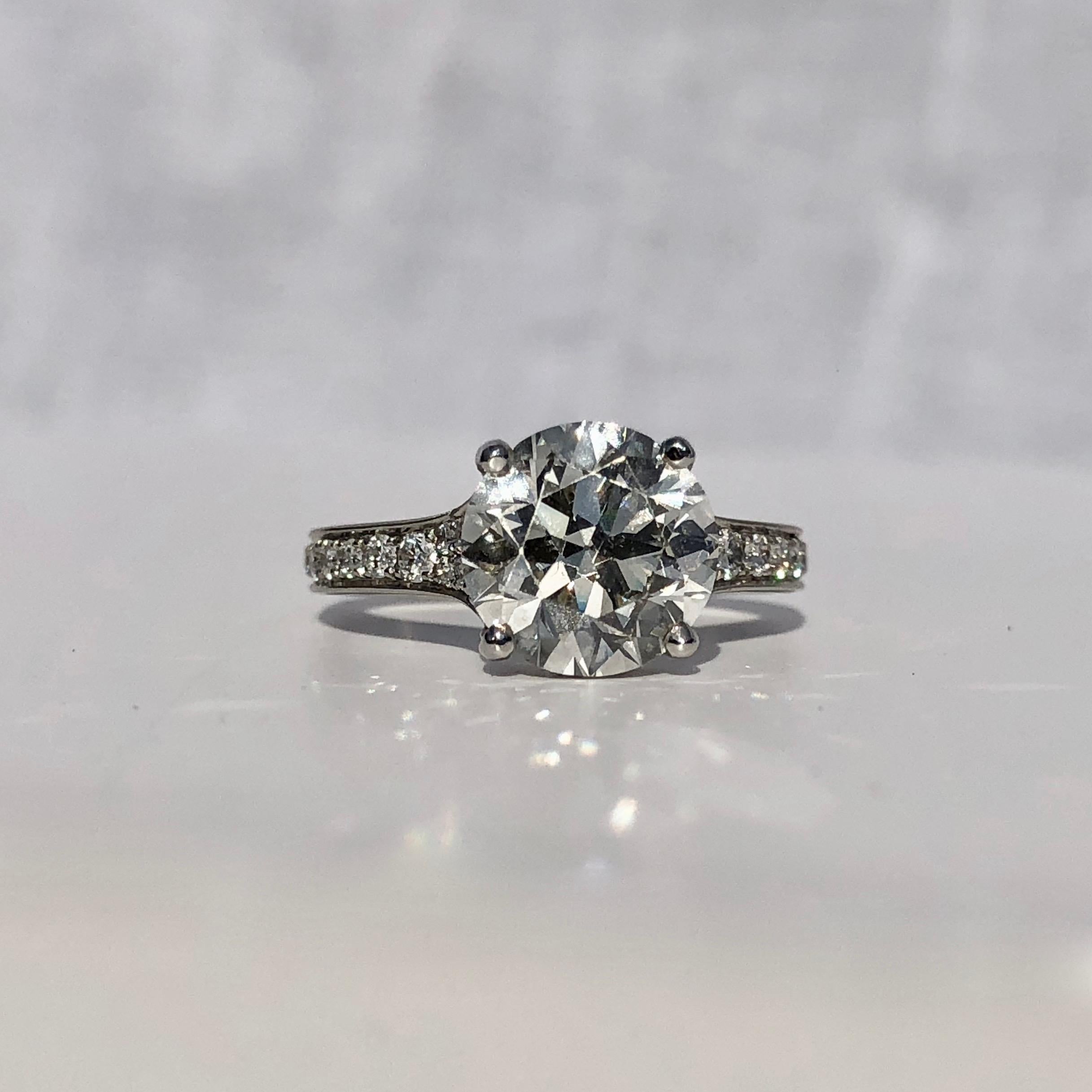 An Transitional Old Brilliant Cut Diamond Re-Set In A Bespoke Platinum Duchess Of Diamonds Mount With Stunning Diamond Enhanced Shoulders and Under Bezel Secret Diamond Halo.

Total Diamond Weight 3.41ct

I Colour VS Clarity Stone of 2.85ct Set In A