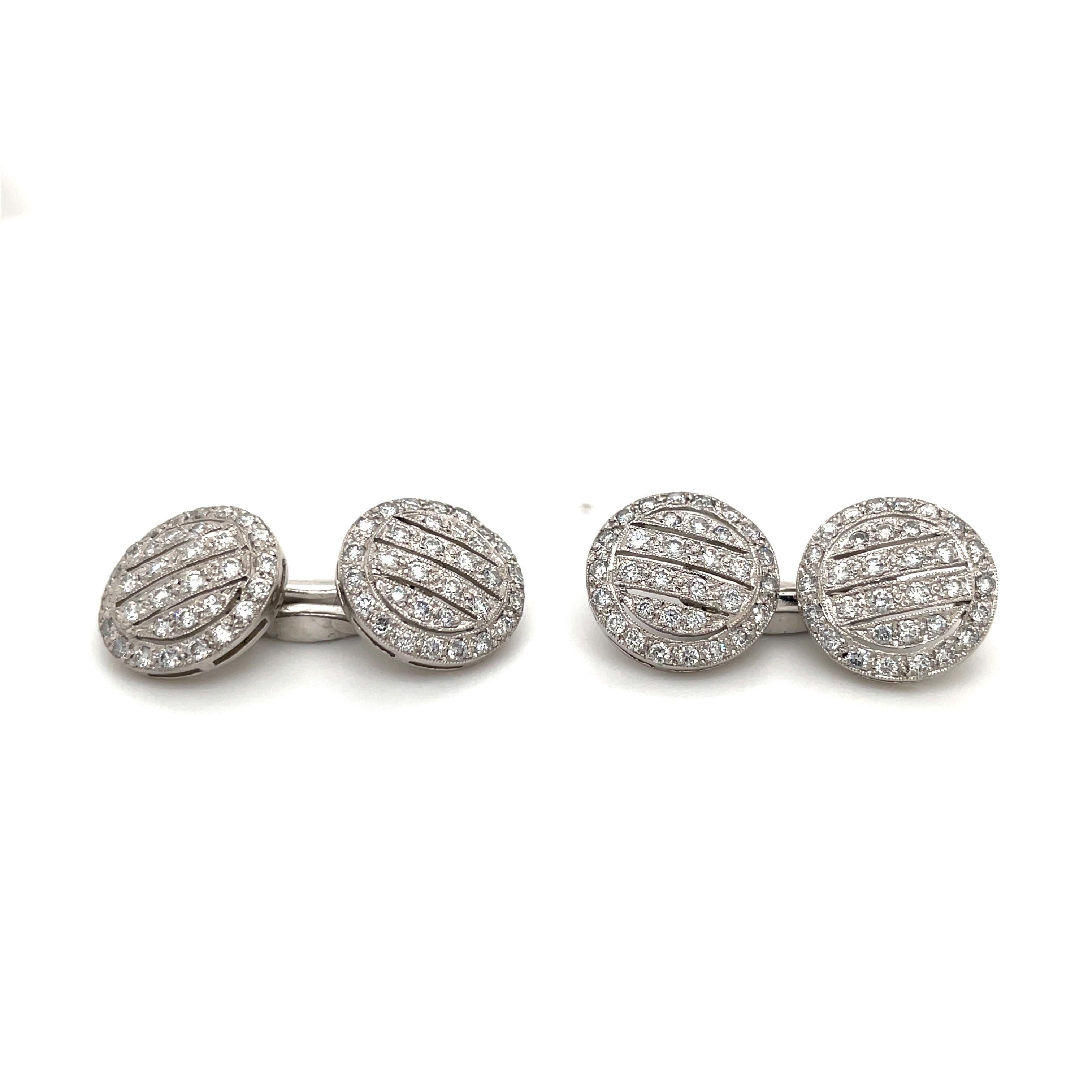  Most brilliant men's dress set.  Double-sided cufflinks and four studs.  Approximately 5.00 carats of full-cut diamonds in an elegant open-work design. A large, full,  dramatic look in the art deco style. Set in platinum. For the gentleman or man