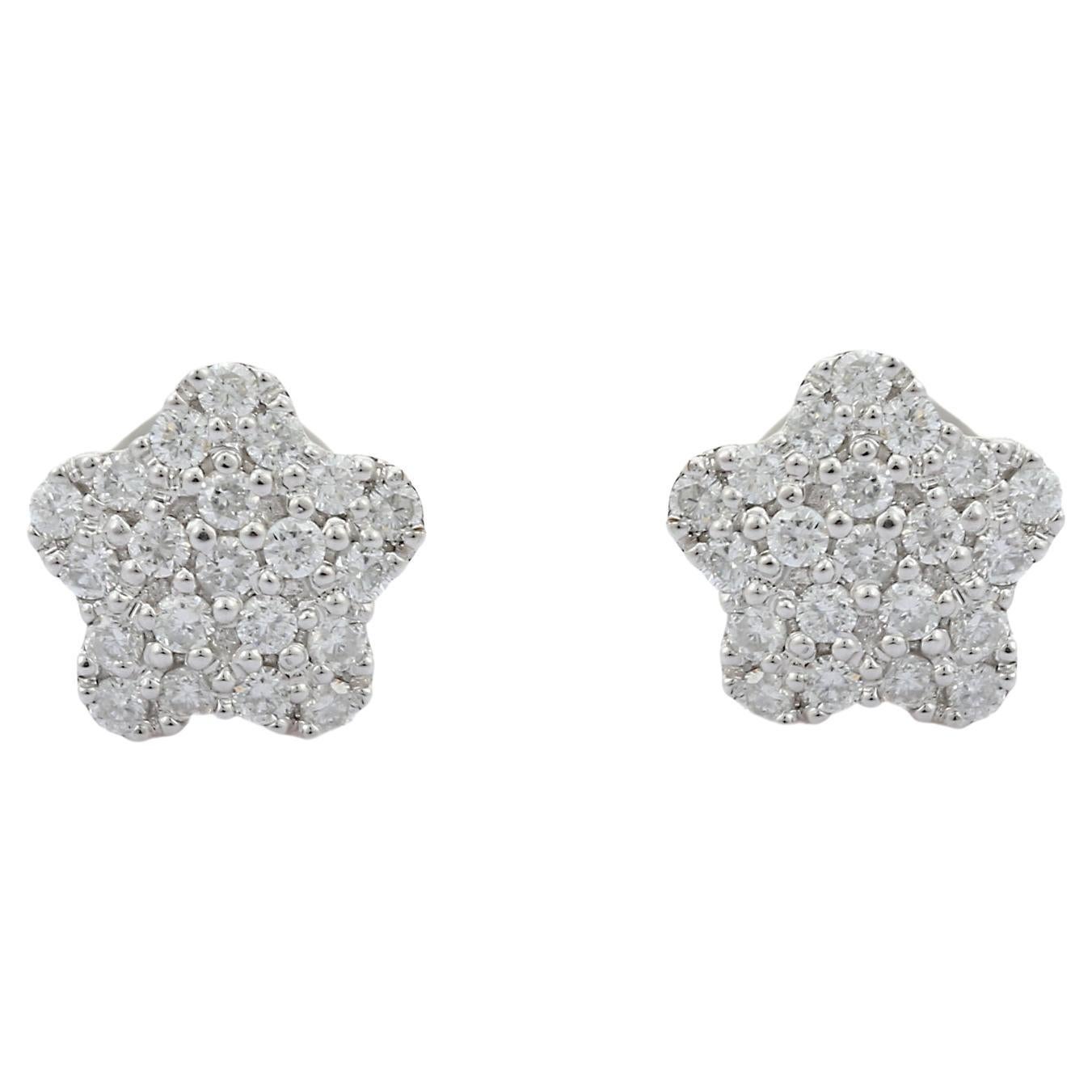 Pendientes flor de diamantes en montura de oro blanco macizo de 14 quilates