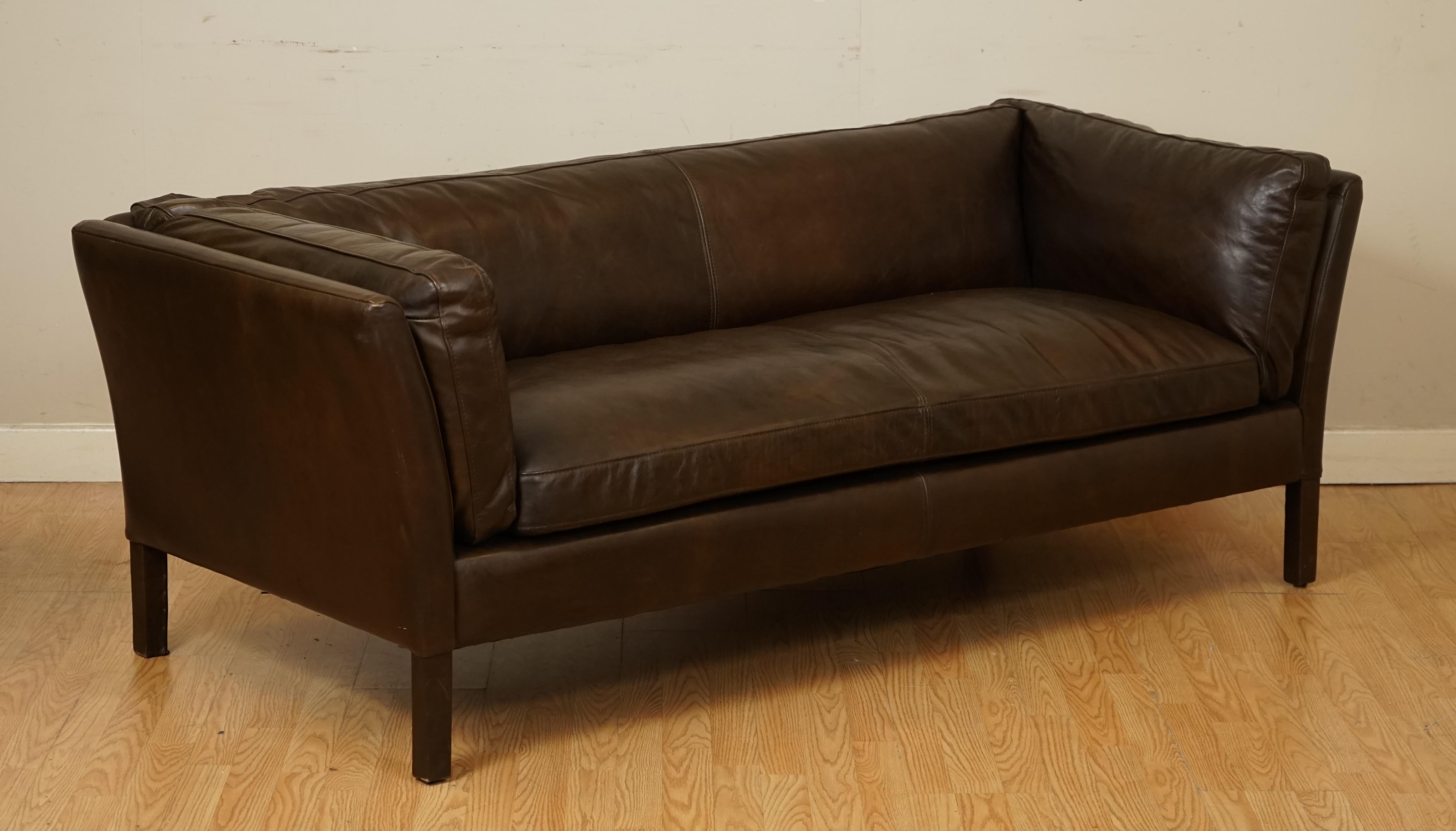 We are so excited to present to you this Pair of Halo Groucho Sofa in Biker Tan Colour.

This pair are in an almost like new condition, the leather is in a very good condition and the cushions are still nice and plump.

The seating and cushions