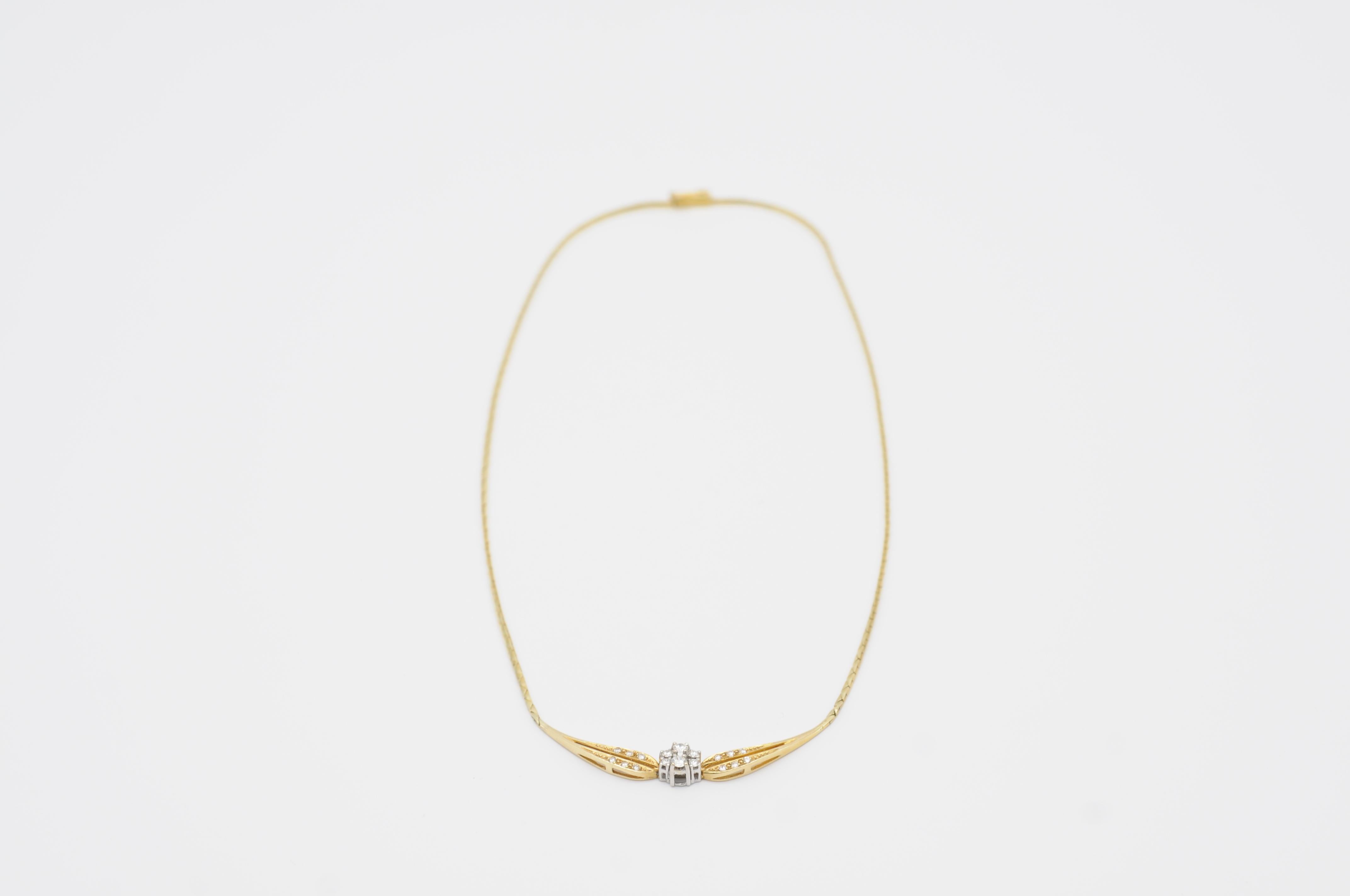 
Introducing the epitome of sophistication and elegance - a brilliant necklace made of 14 carat yellow gold. This exquisite piece of jewelry will take your breath away with its impeccable craftsmanship and luxurious design.

Featuring a total carat