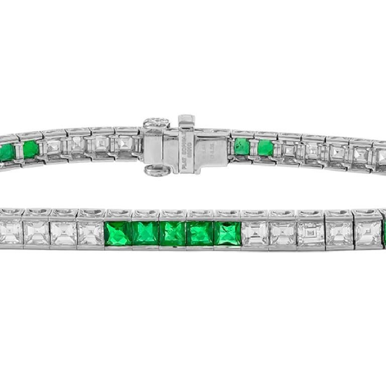 Sophisticated platinum green emerald with a total weight of 3.92 carat and 5.40 carat weight diamond bracelet. 

