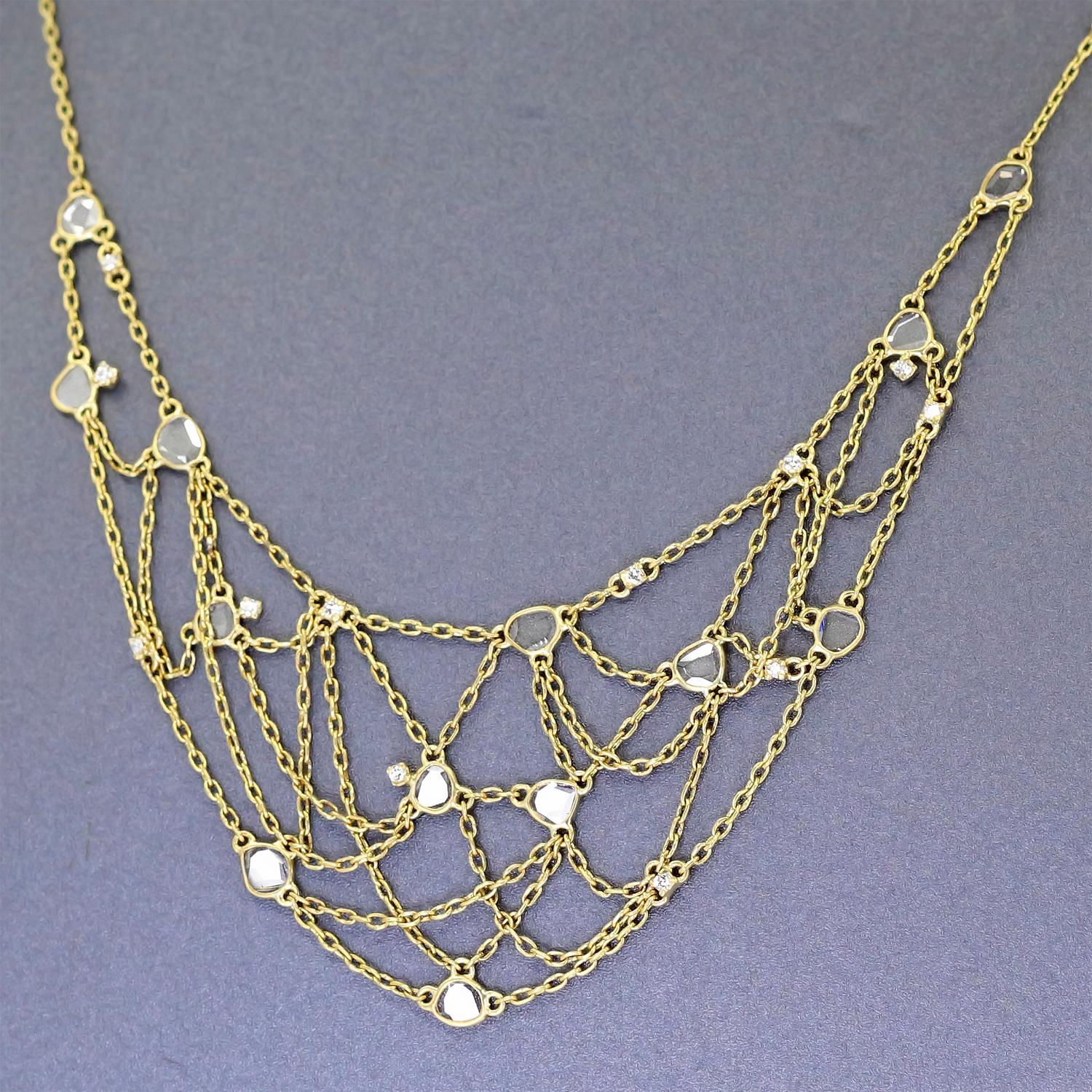 One of a Kind Diamond Bib Necklace handmade in matte finished 18k yellow gold by Tej Kothari featuring thirteen bezel-set shimmering polki diamond faceted slices totaling 0.75 carats accented with twelve prong-set round brilliant-cut white diamonds