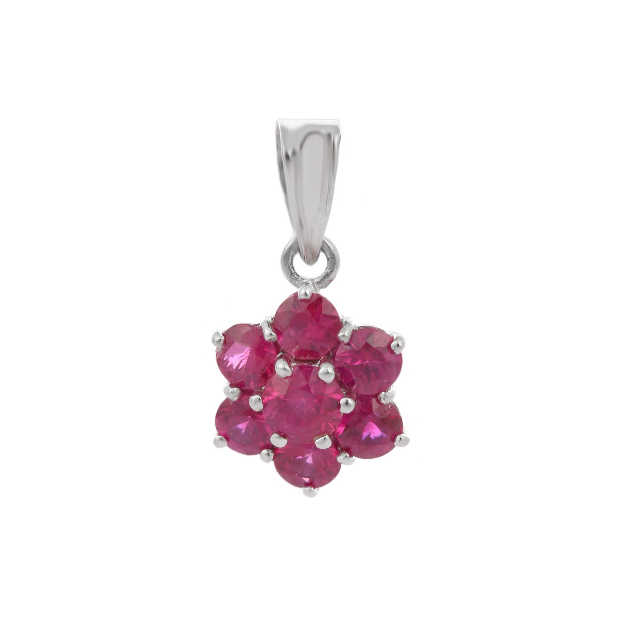 Round cut ruby flower pendant in 18K Gold. It has a round cut ruby that completes your look with a decent touch. Pendants are used to wear or gifted to represent love and promises. It's an attractive jewelry piece that goes with every basic outfit