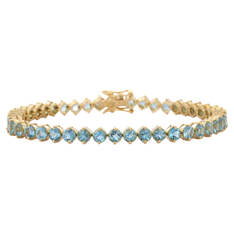Brilliant Round Cut Aquamarine Modern Tennis Bracelet in 18K Yellow Gold For Sale at 1stDibs