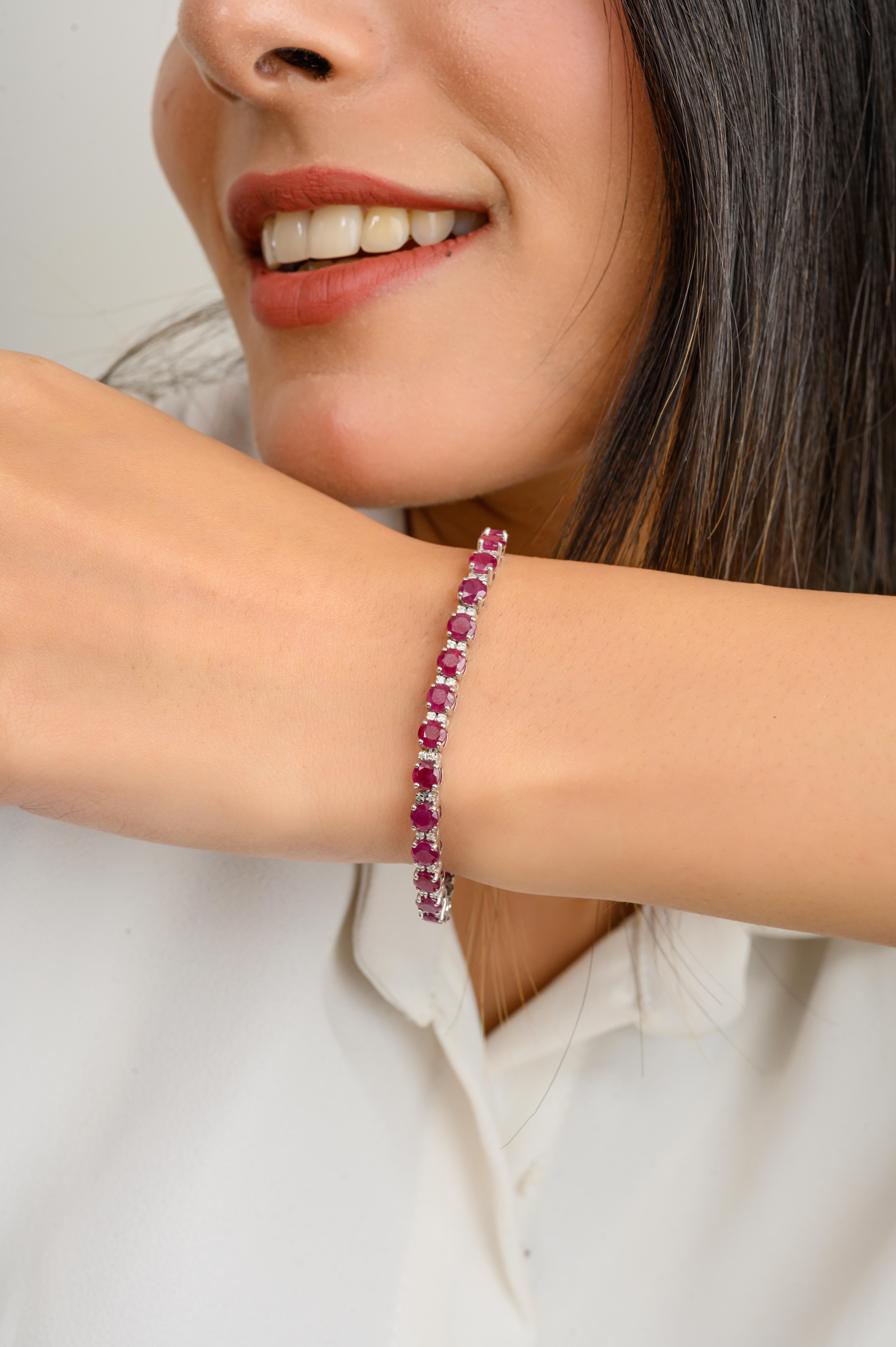 This Brilliant Round Cut Ruby Diamond Tennis Bracelet for Wedding in 14K gold showcases endlessly sparkling natural ruby, weighing 12.56 carat and diamonds weighing 0.34 carats. It measures 7 inches long in length. 
Ruby improves mental