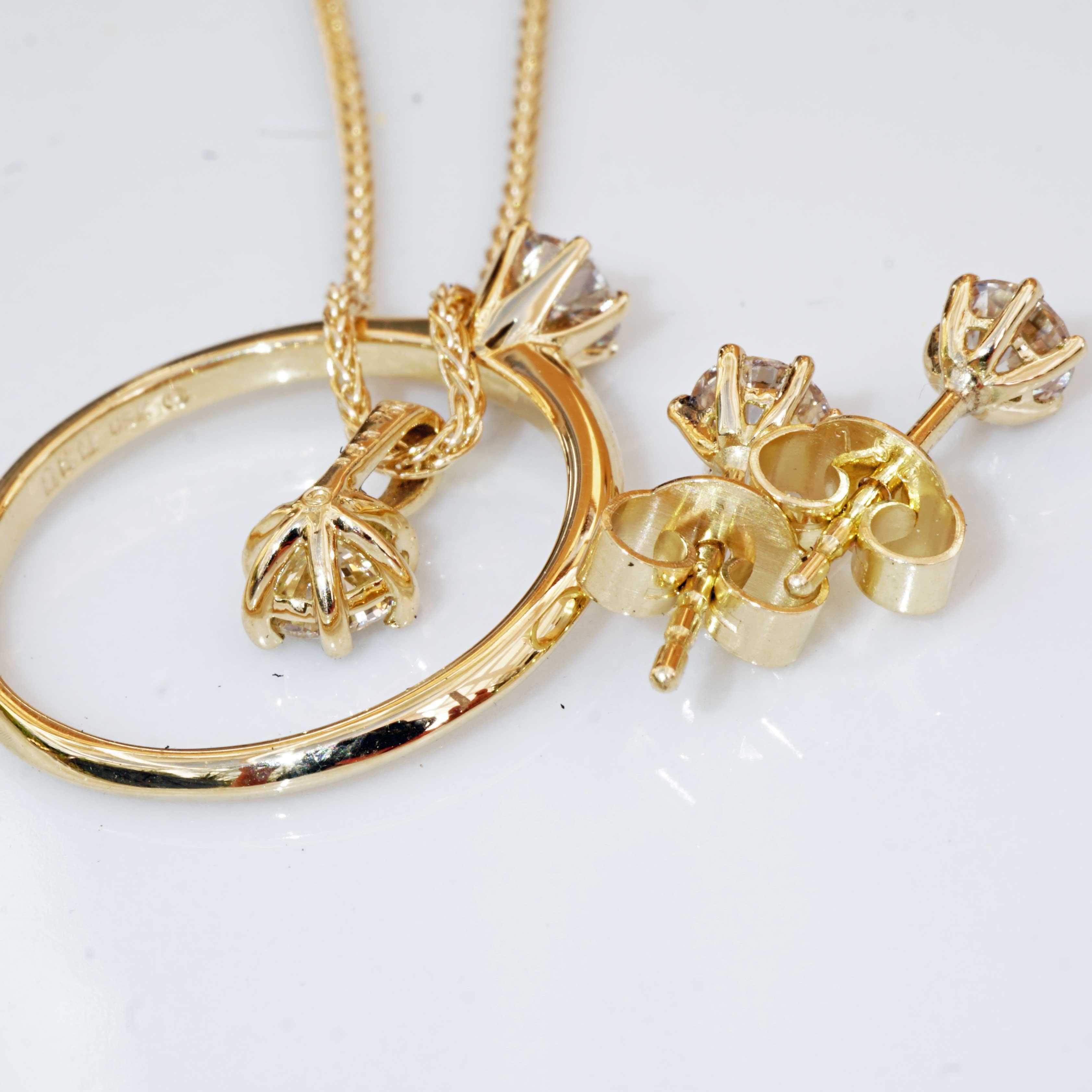 Brilliante con ciondolo, anello e orecchini 18 kt  totale 1,20 ct VS Co. Silhouette in vendita 7