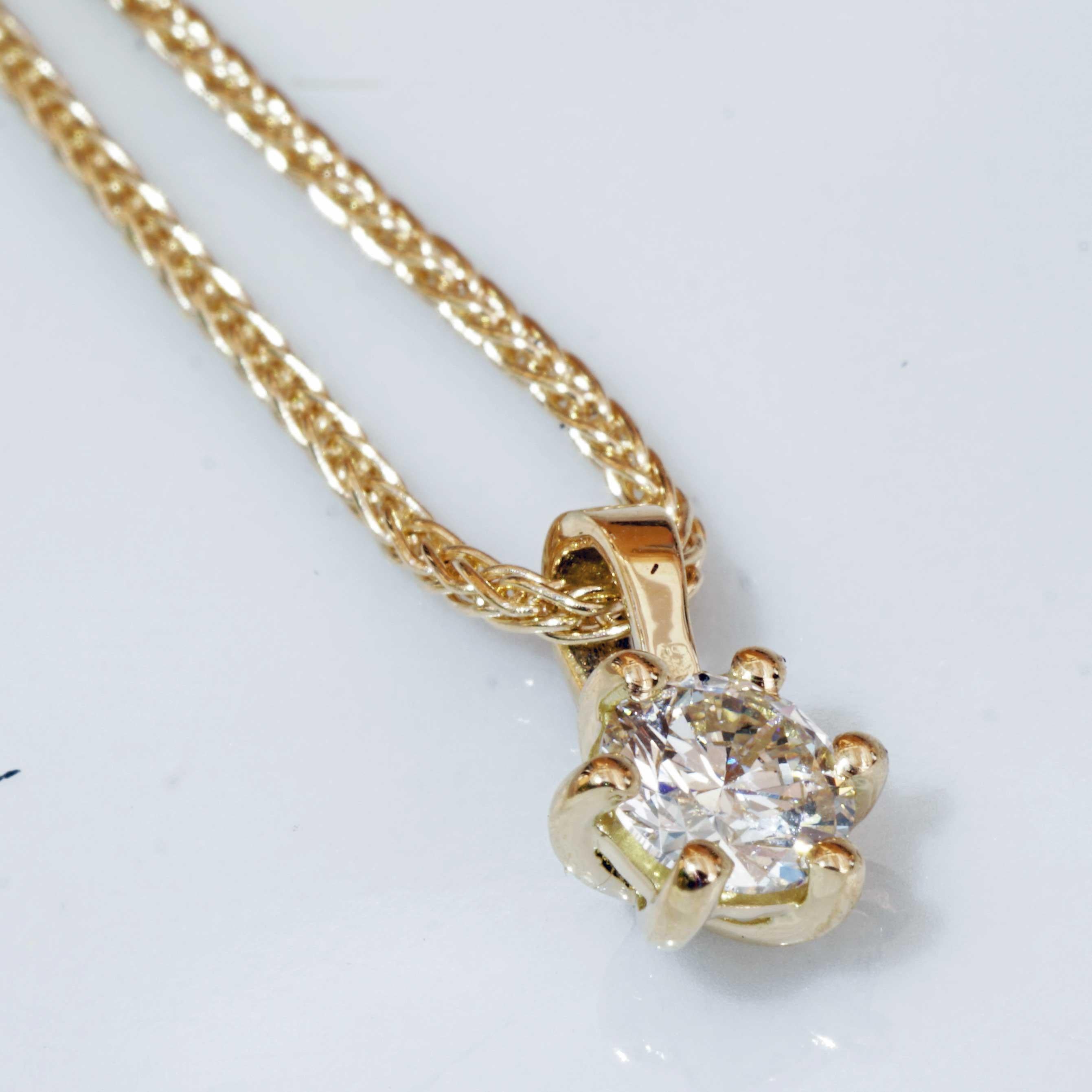 Brilliante con ciondolo, anello e orecchini 18 kt  totale 1,20 ct VS Co. Silhouette in vendita 1
