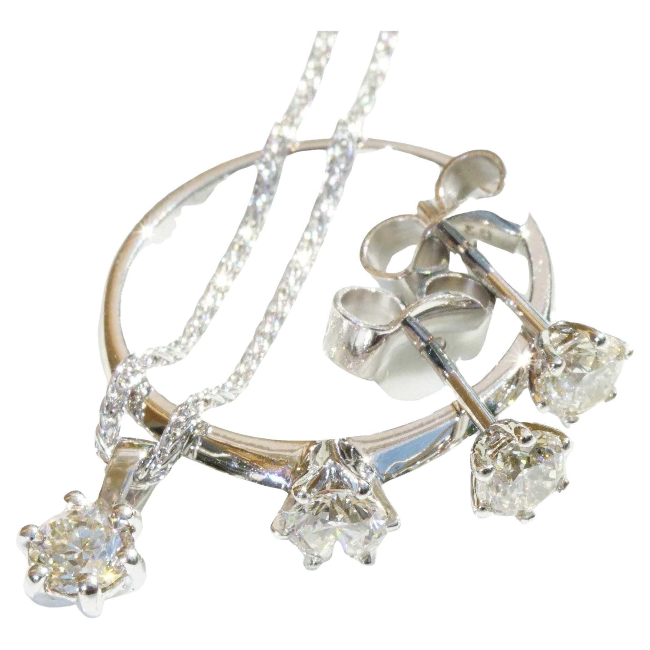 Brilliant Set with Pendant Ring Earstuds 18 kt  total 1.20 ct VS Co. Silhouette