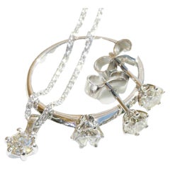 Brilliant Set with Pendant Ring Earstuds 18 kt  total 1.20 ct VS Co. Silhouette