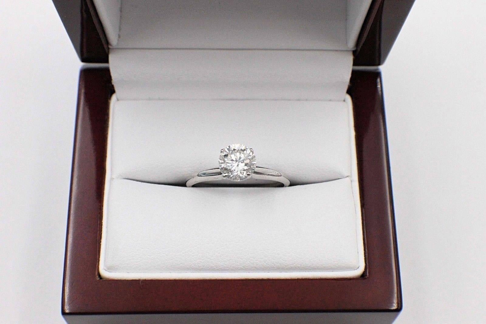 BRILLIANT STAR
Style:  Solitaire 4-Prong Engagement Rings
Serial Number:  EGL USA # US35516701D
Metal:  White Gold 14KT
Size:  6 - sizable  
Total Carat Weight:  1.05 CTS
Diamond Shape:  Round Modified Brilliant
Diamond Color & Clarity:  H /