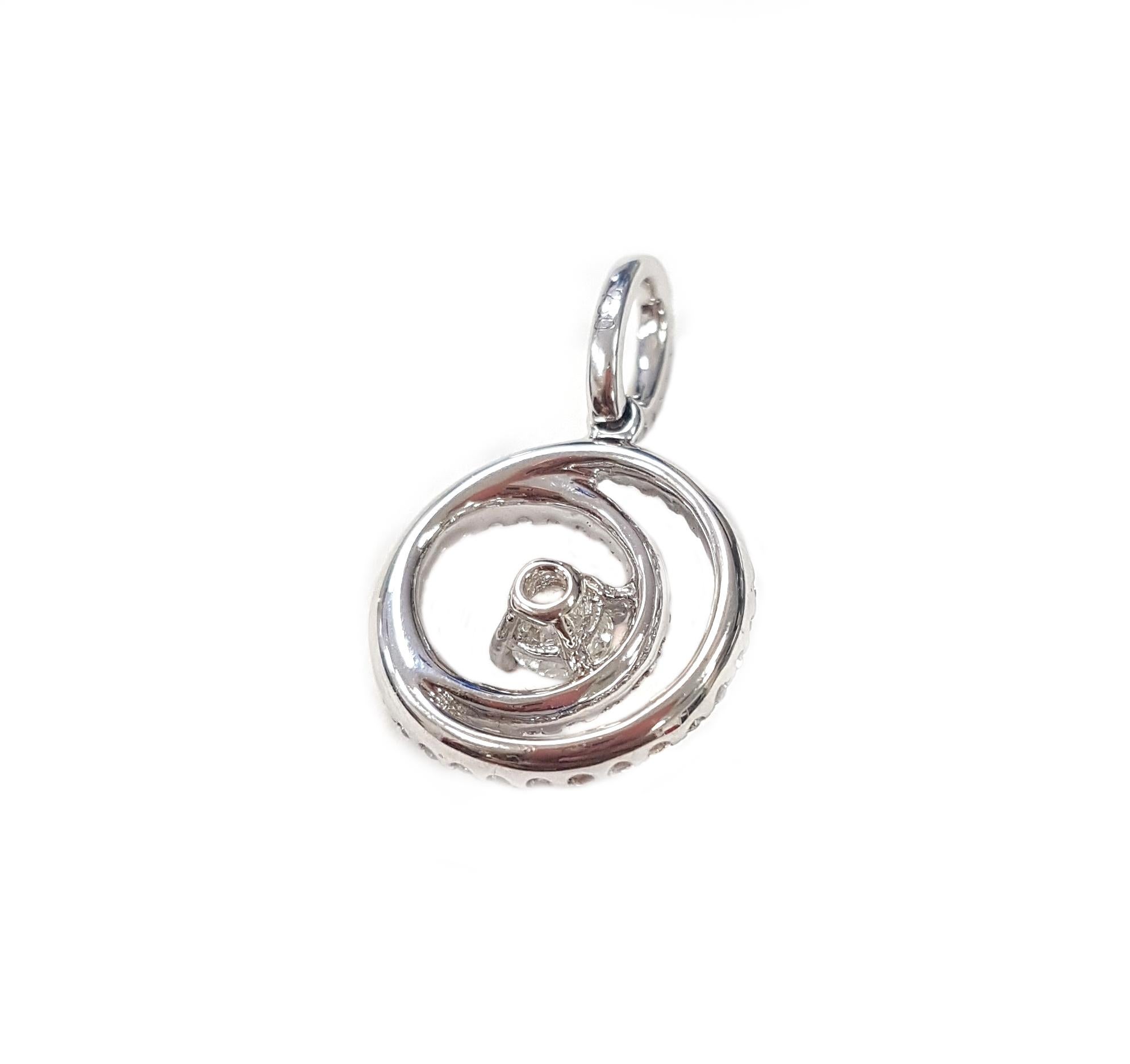 Contemporain Pendentif contemporain en forme de spirale en or 18 carats avec diamants en vente