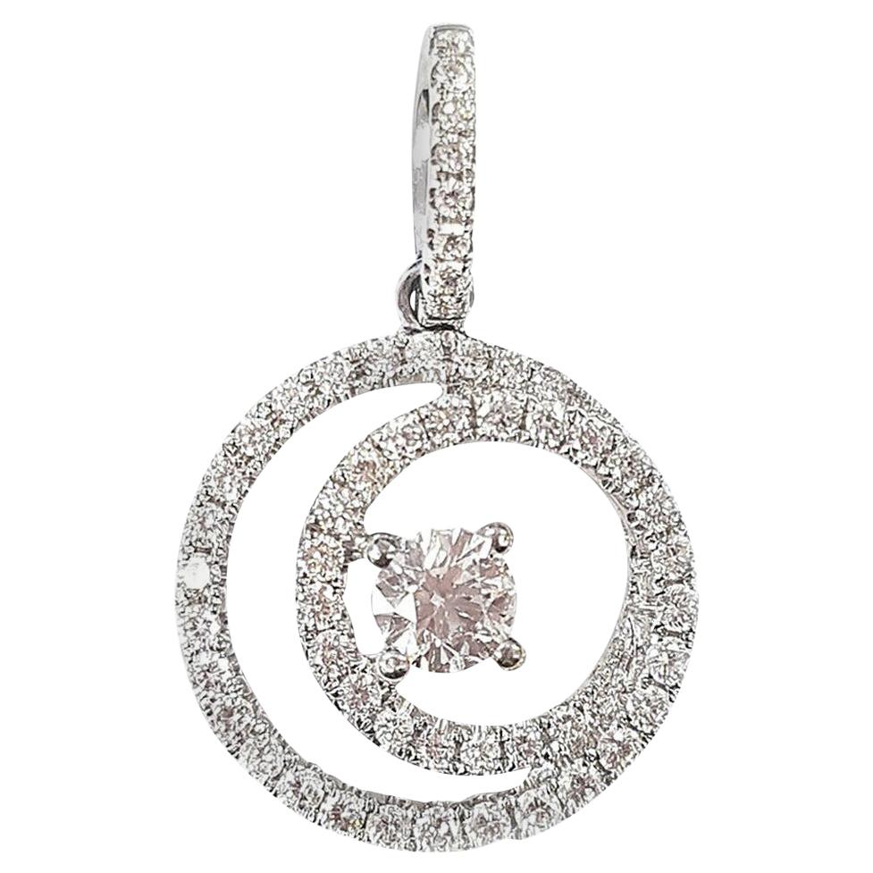 Pendentif contemporain en forme de spirale en or 18 carats avec diamants en vente