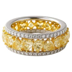 Bague en or blanc 18 carats sertie de diamants jaunes (5,56 carats au total) et de diamants blancs (0,80 carats au total)