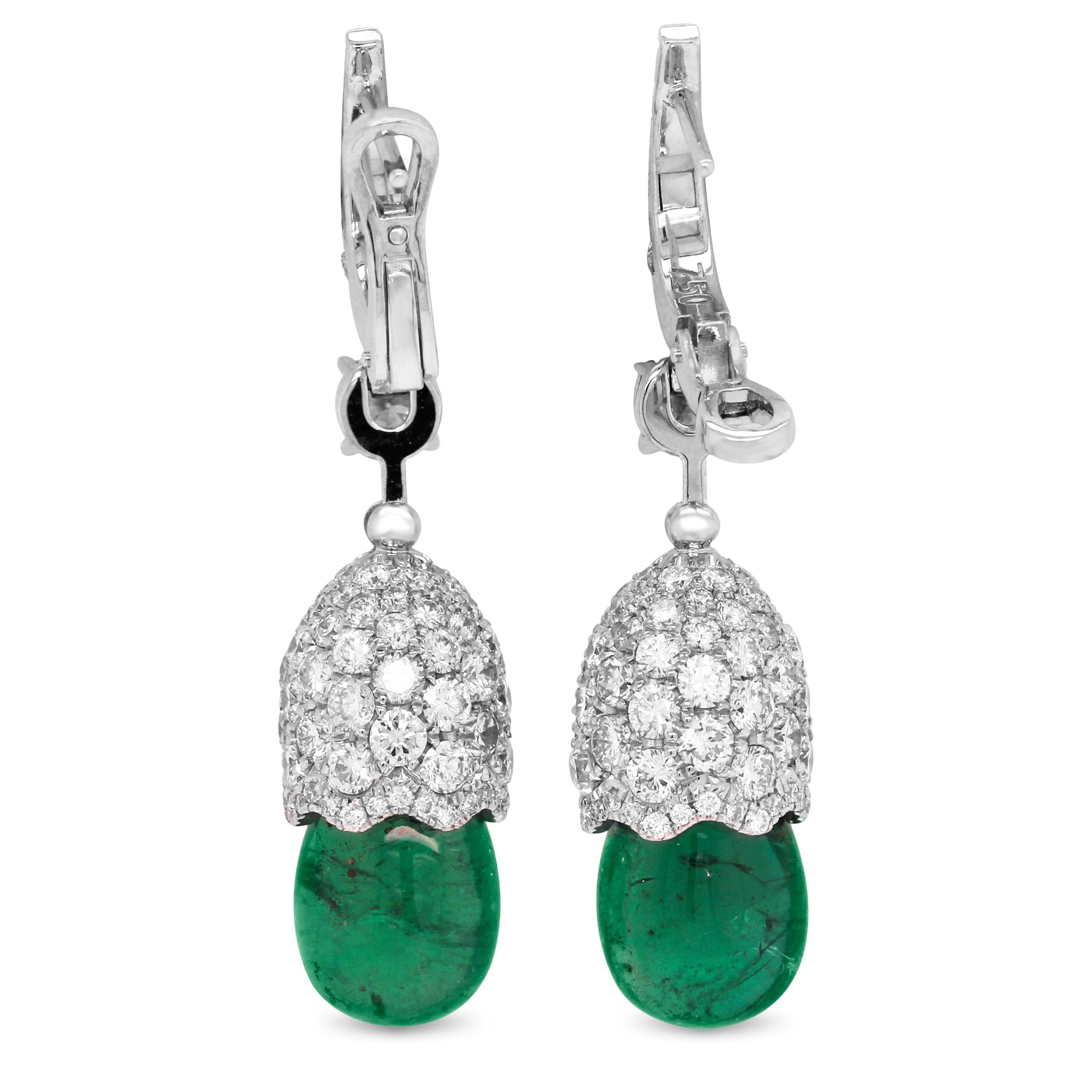Briolette Cabochon Colombian Emeralds 18K White Gold Diamond Dangle Earrings

These one of a kind earrings features pavé set diamonds all around the top of the two Emeralds.

11.21 carat Cabochon, Briolette cut Colombian Emeralds

3.90 carat G