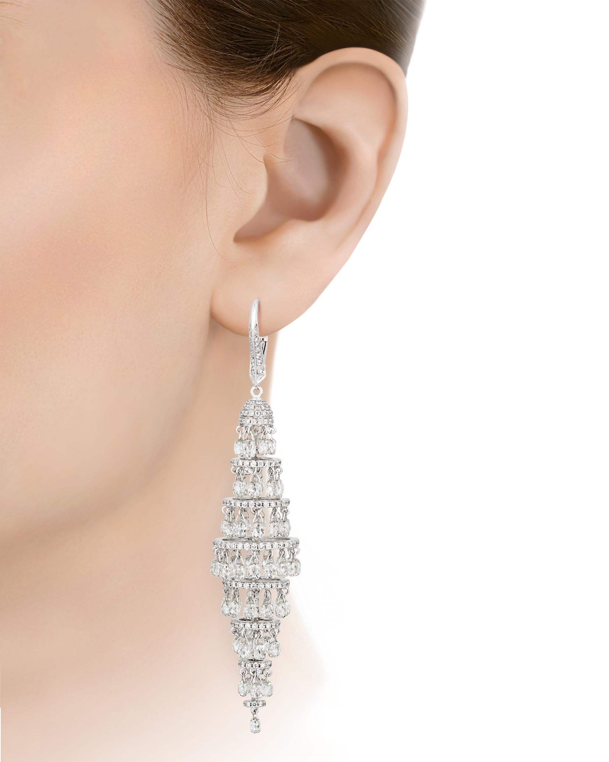Timelessly elegant with a striking effect when worn, these beautiful chandelier earrings feature an impressive 19.07 carats of sparkling white diamonds faceted into the elegant briolette cut. Briolette is a style of gemstone cut that is