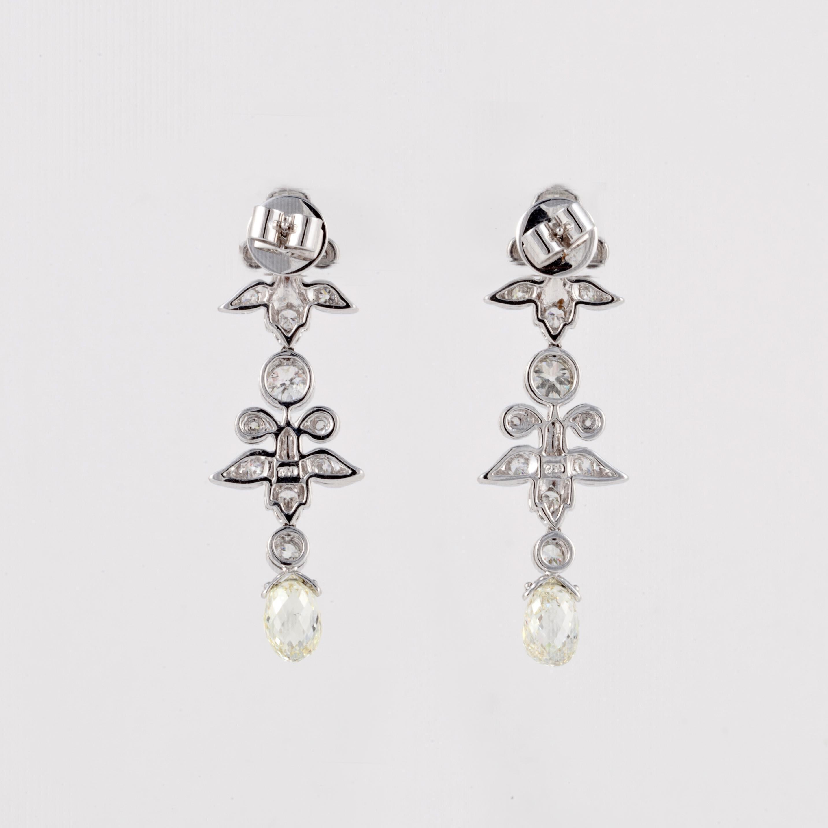 A pair of diamond drop earrings composed of 18K white gold and diamonds.  There are 26 round diamonds totaling 3.50 carats; G-H color and VS1-SI2 clarity.  There are two briolette diamonds that total 4.50 carats; I-J color and VS1-SI1 clarity.  They