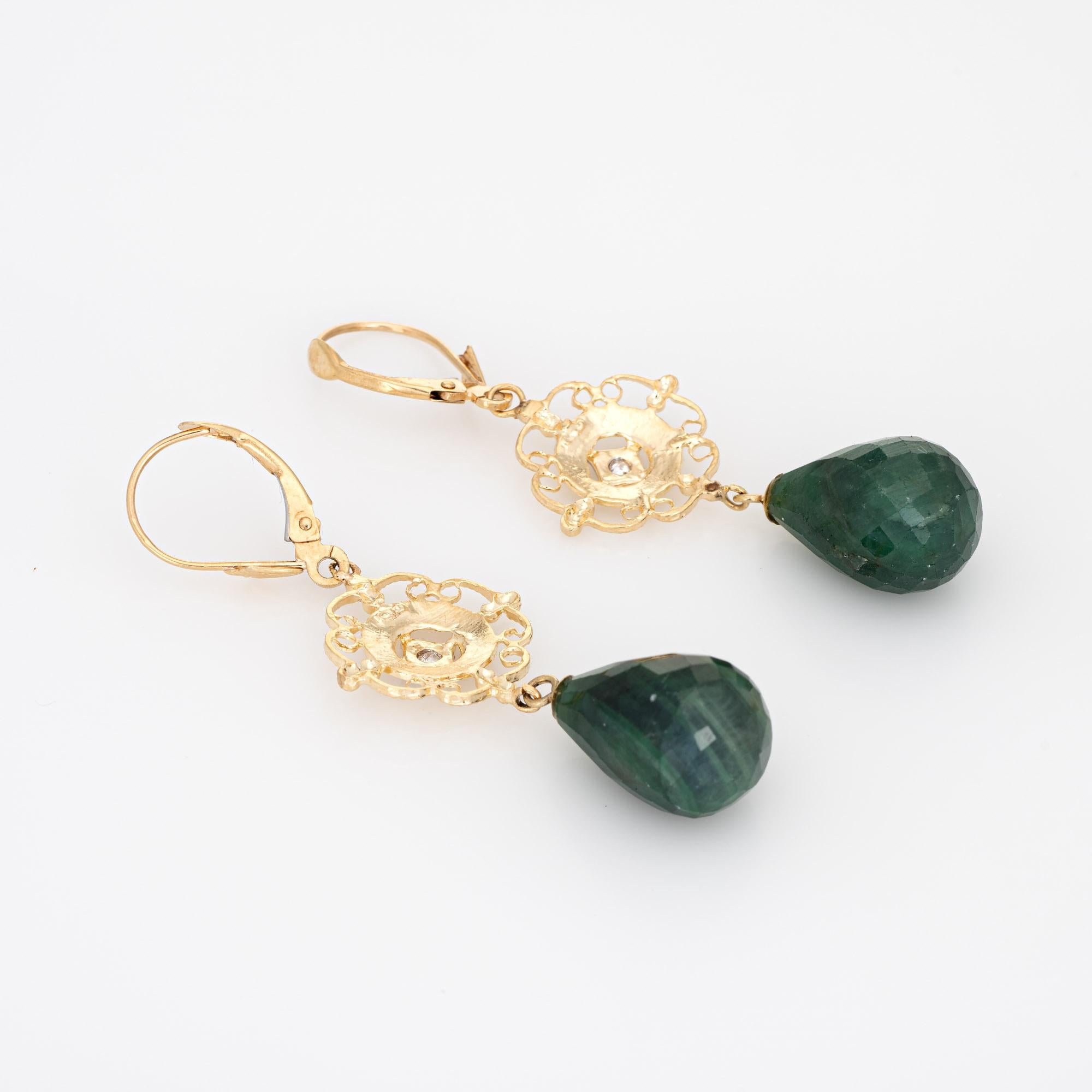 Elegant pair of vintage briolette faceted emerald & diamond earrings crafted in 14k yellow gold. 

Briolette faceted emeralds measure 15mm x 10.5mm. The diamonds total an estimated 0.02 carats (estimated at H-I color and I1 clarity). 

The elegant
