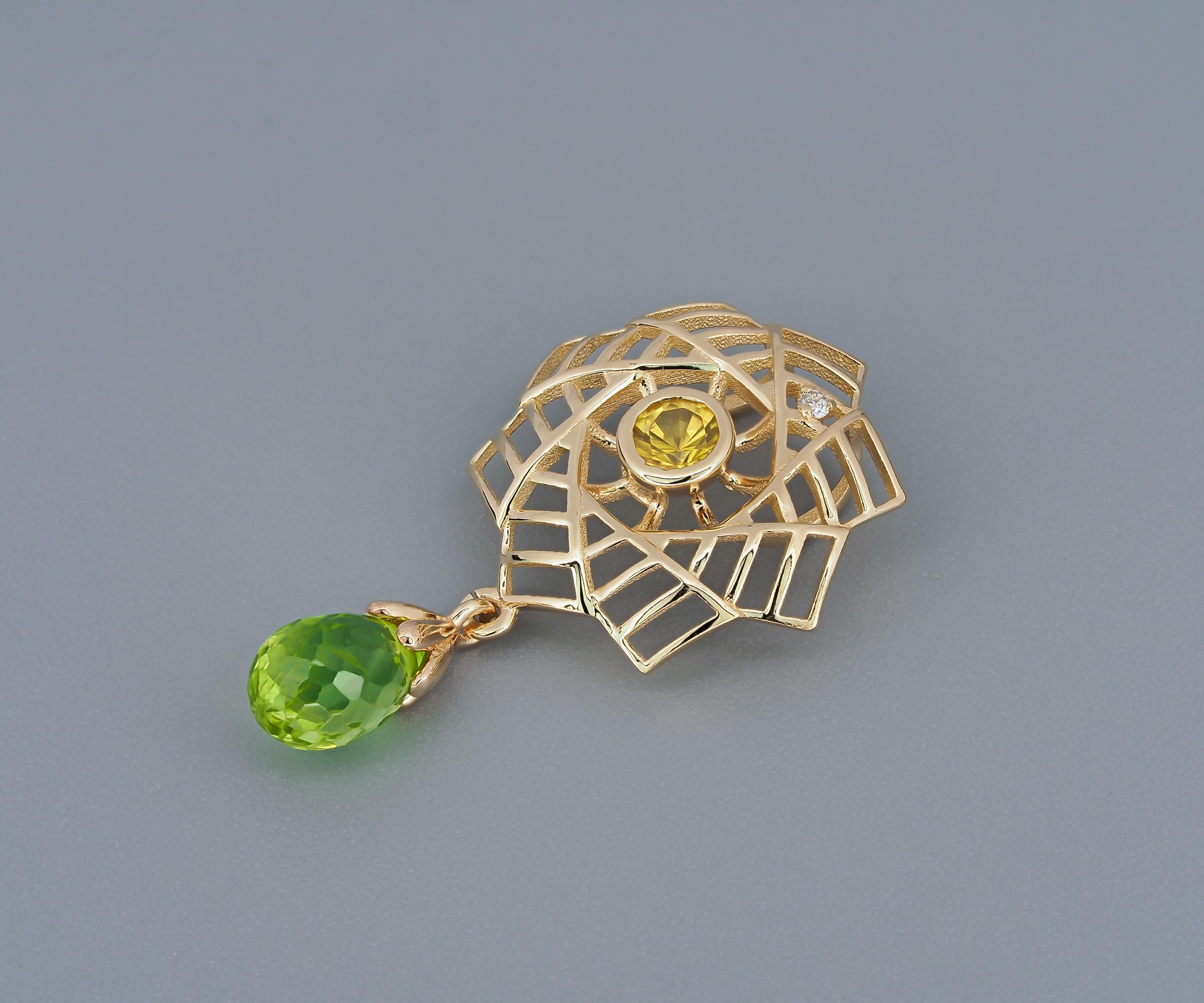 Briolette peridot pendant in 14k gold. 
Apple green peridot, Yellow sapphire pendant. Briolette gemstone pendant. Colorful gemstones charm.

Material: 14k gold
Weight: 1.55 g.
Pendant size: 25x13.46 mm.

Peridot: 1 pieces, green - color, briolette