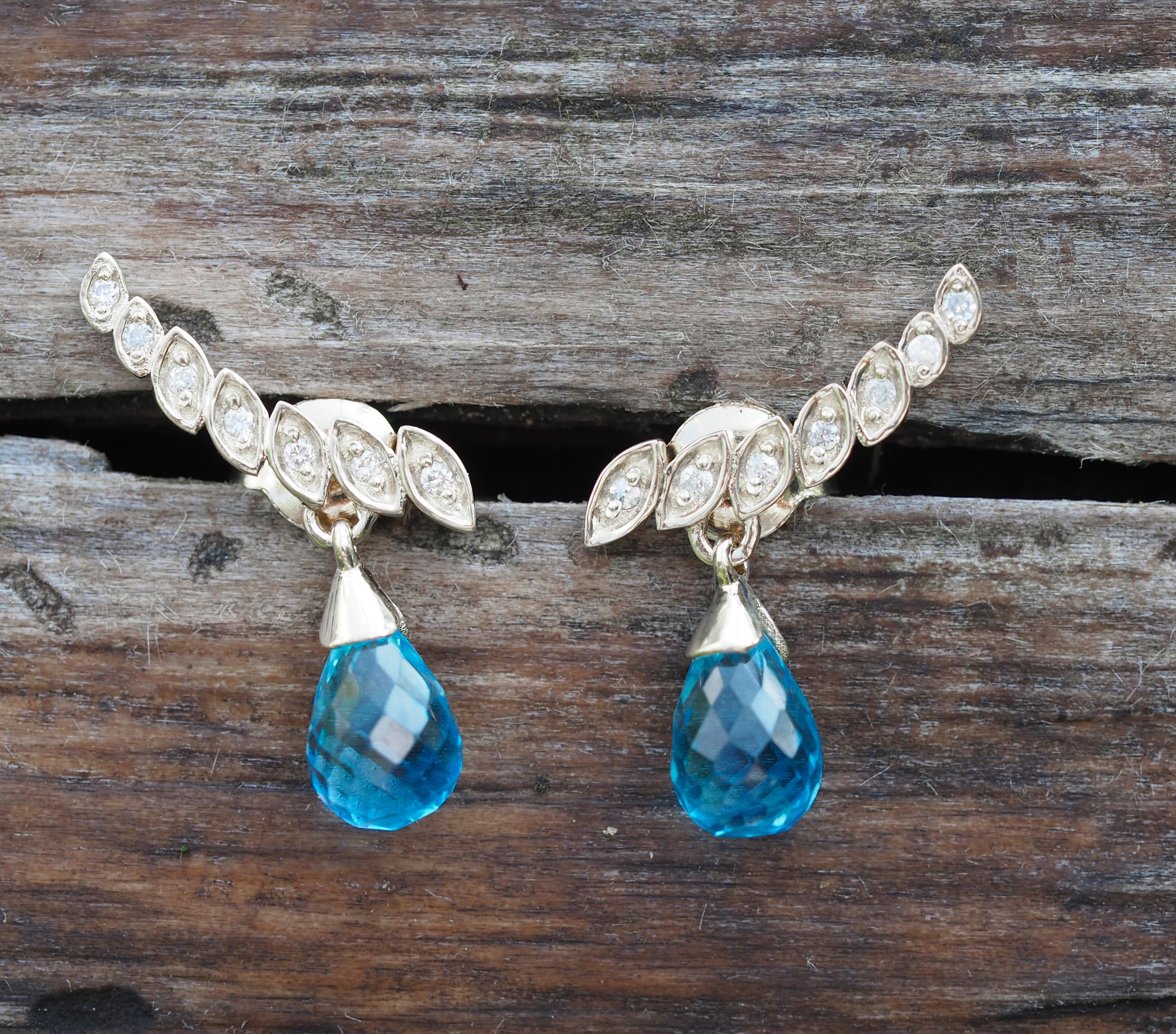 Briolette topazes earrings studs in 14k gold. 
Topaz drop earrings. Statement topaz earrings. Everyday topaz earrings. Sky blue topaz earrings.

Total weight: 2.70 g.
Metal: 14k gold.
Size 16 x 10 mm.

Central stones: Topazs - 2 pieces
Cut: