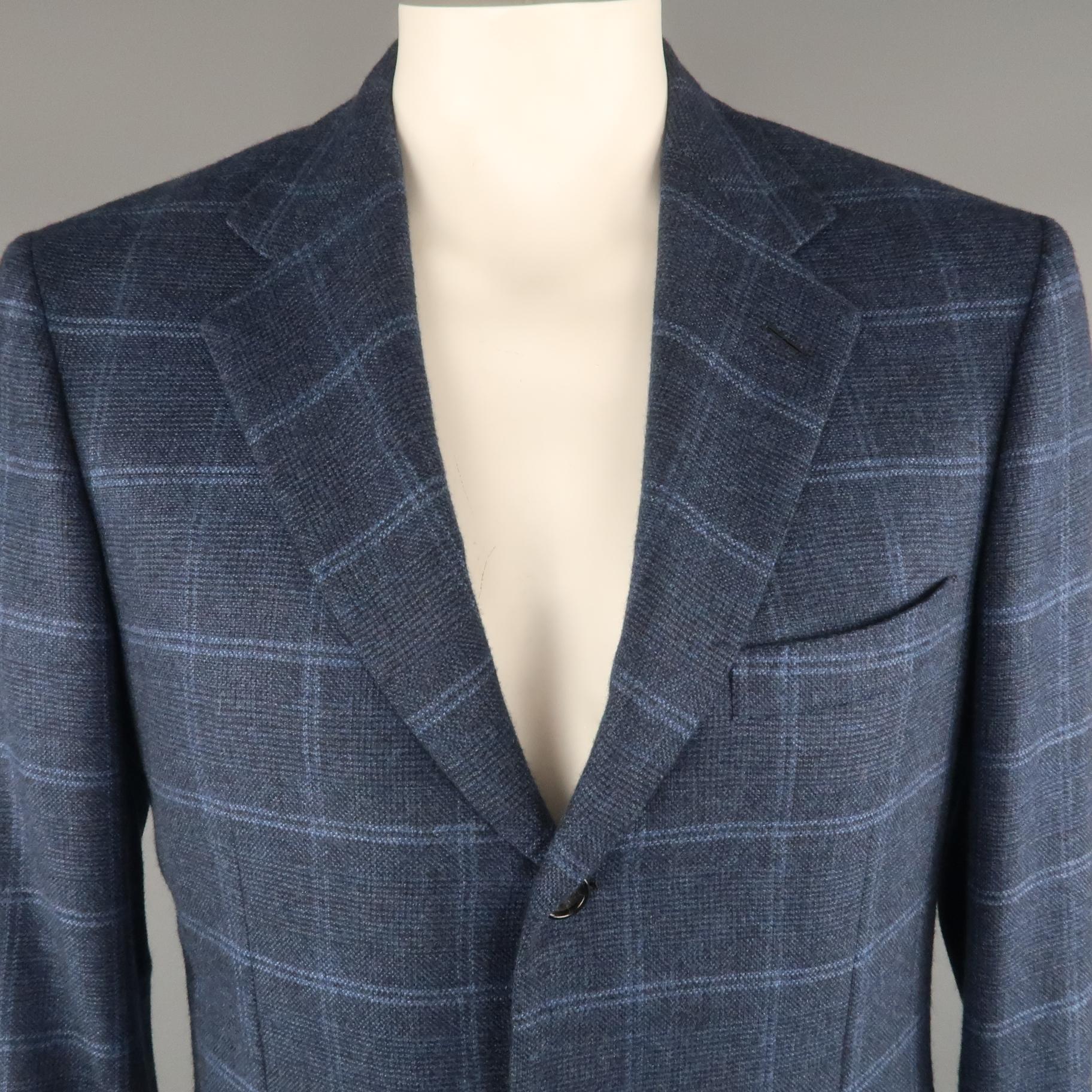 BRIONI for WILKES BASHFORD Sport Coat comes in a navy tone in a window pane cashmere material, with a notch lapel, slit and flap pockets, 3 buttons at closure, single breasted, and a double vent at back. Made in Italy.
 
Excellent  Pre-Owned