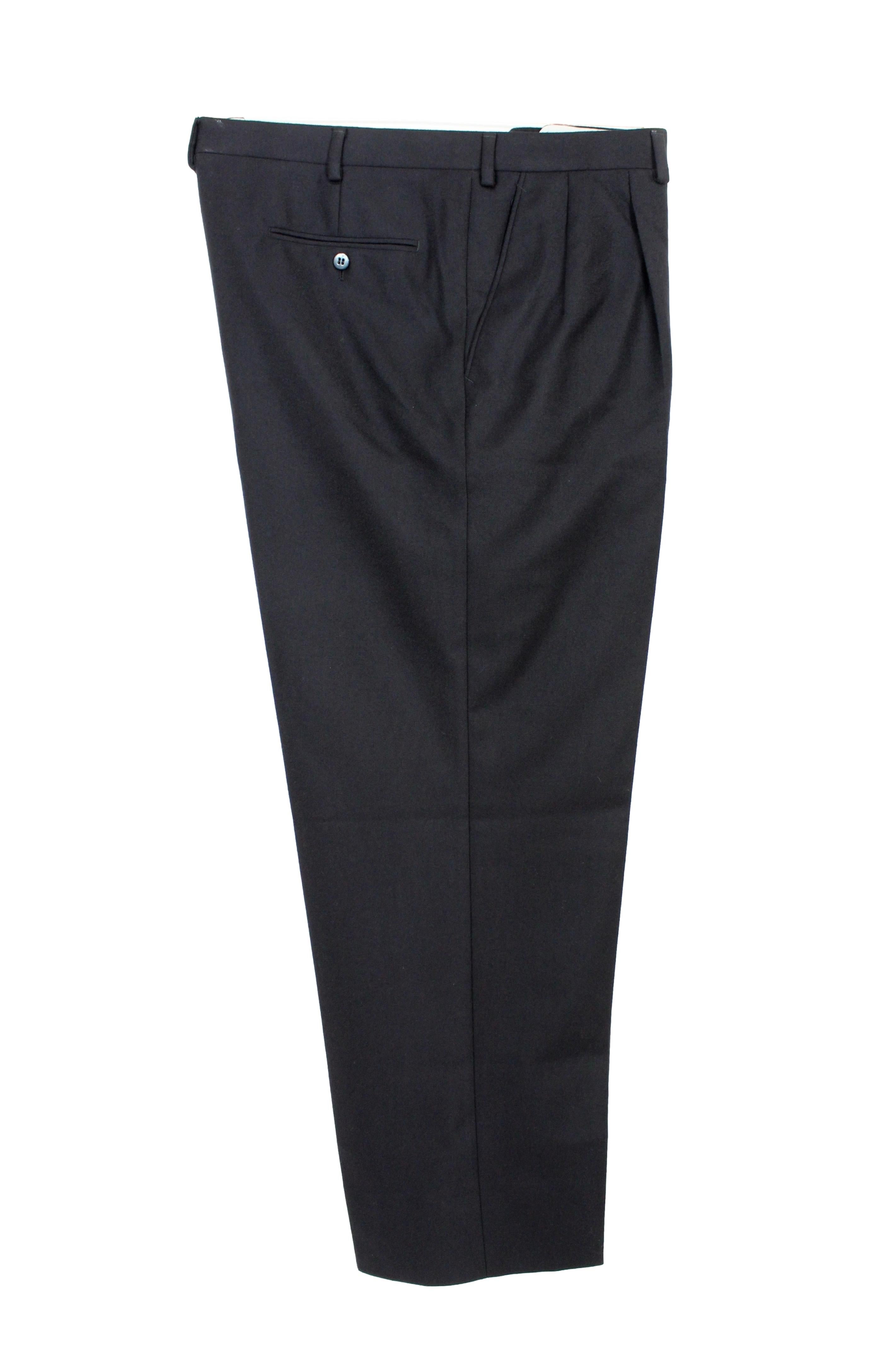 Brioni vintage 90s trousers. Classic trousers, black color, 5 pockets. 100% wool fabric. Made in Italy, New without tag, coming from stock. The trousers have probably been shortened and the sill inserted.

Size: 60 Reg It 50 Us 50 uk

Waist: 52