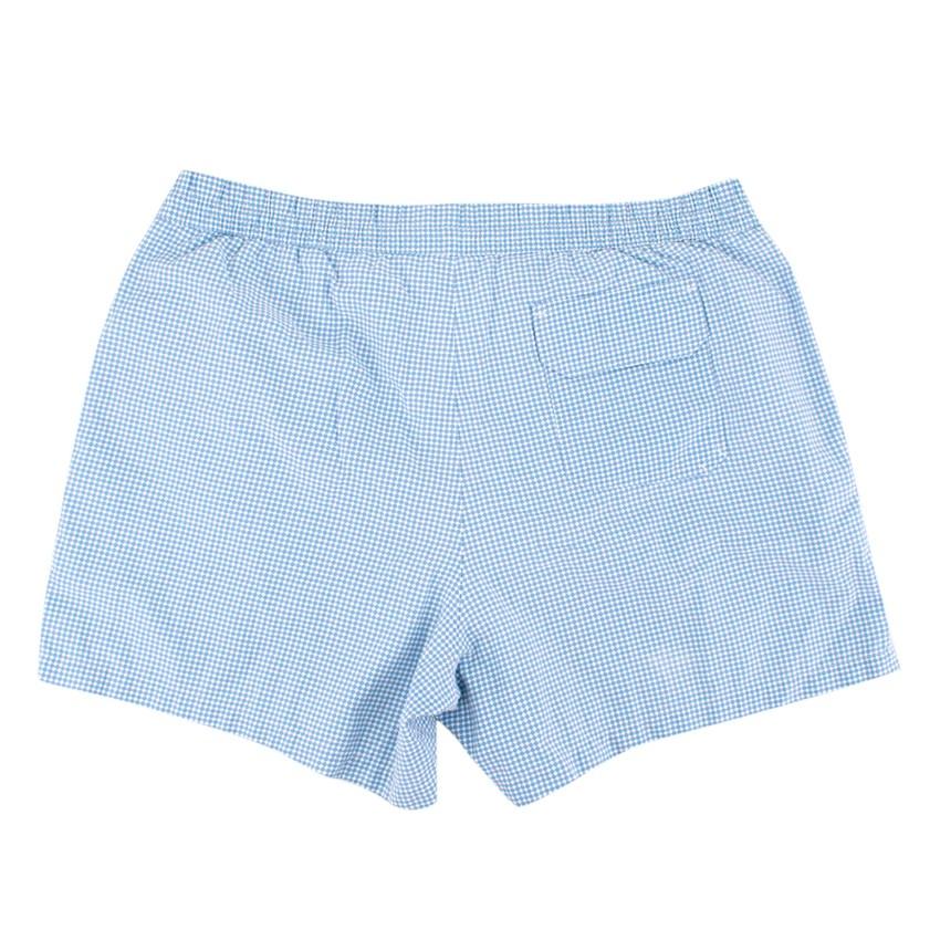 Brioni Blue Patterned Swim Shorts

- Blue patterned swim shorts
- Elasticated drawstring waist
- Mesh lining
- Front side pockets
- Back velcro fastening pocket

Please note, these items are pre-owned and may show some signs of storage, even when