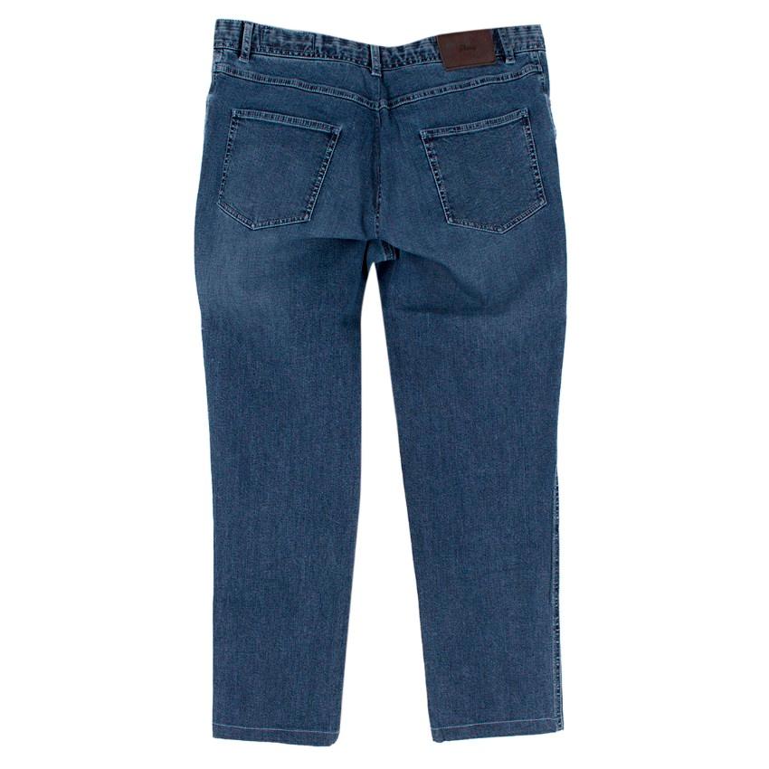 Brioni Men's Stelvio Blue Jeans

- Blue jeans
- Regular fit
- Centre-front button and concealed zip fastening
- Silver plated button with logo engraved
- Belt loops
- Classic five style pockets
- Brown leather patch at the back with logo