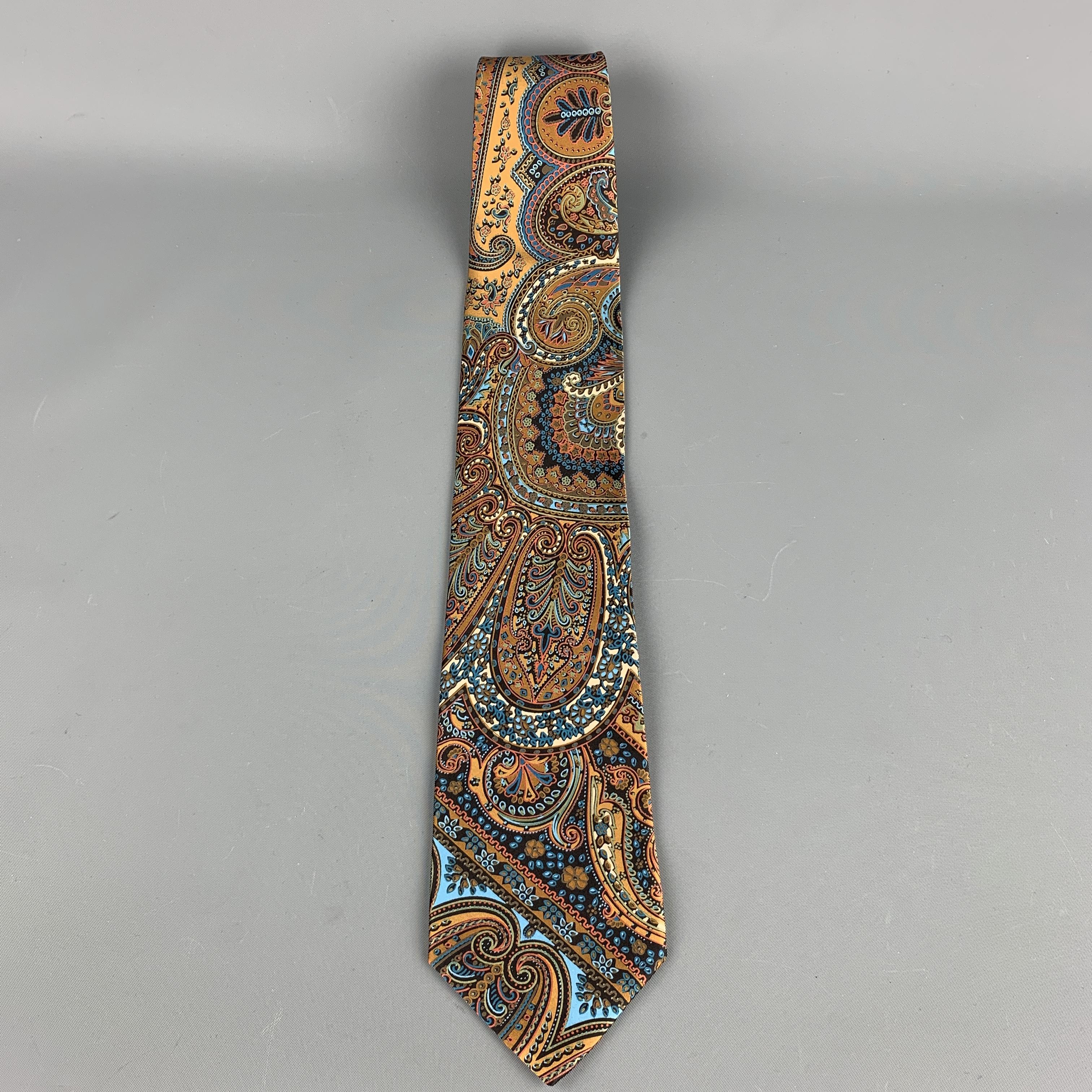 BRIONI Tie comes in multi-color tones in a silk material, with all over paisley print. Handmade. Made in Italy.
 
Excellent Pre-Owned Condition.
 
Width : 3.5 in

