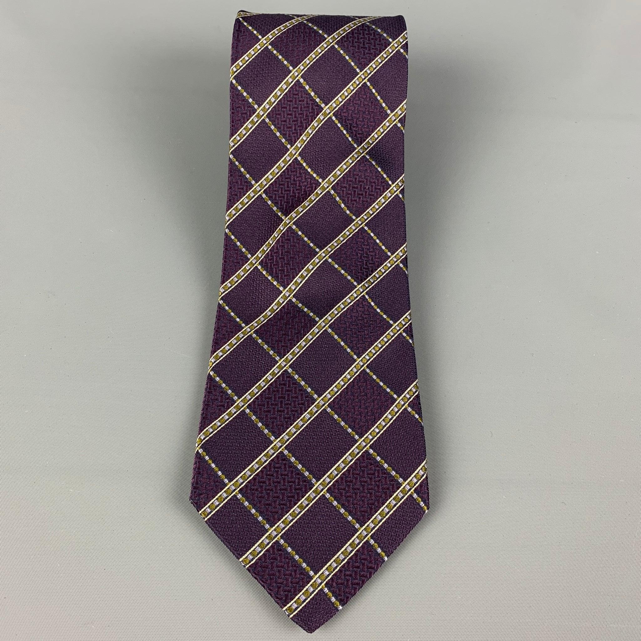 BRIONI
necktie comes in a purple & white silk with a all over textured grid print. Made in Italy. Very Good Pre-Owned Condition.Width: 3.75 inches  Length: 61 inches 
  
  
 
Reference: 120409
Category: Tie
More Details
    
Brand:  BRIONI
Gender: 