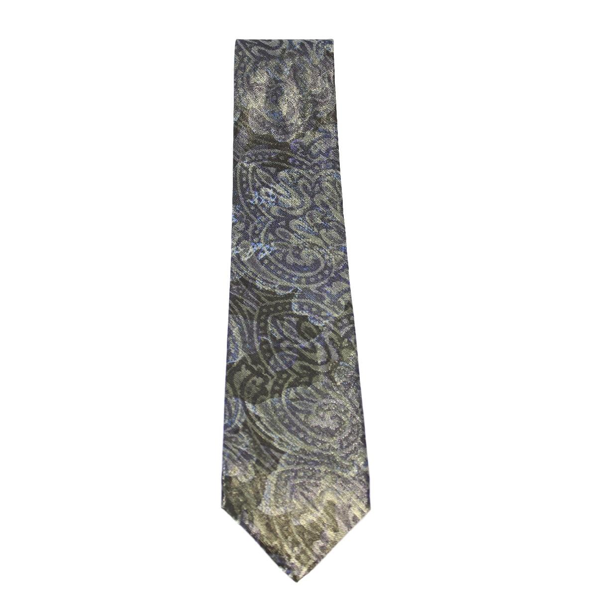 Brioni vintage evening tie. The tie has colors ranging from purple to gold with floral designs, 100% silk. Made in Italy. New with label.

Length: about 150 cm
Width: about 9 cm