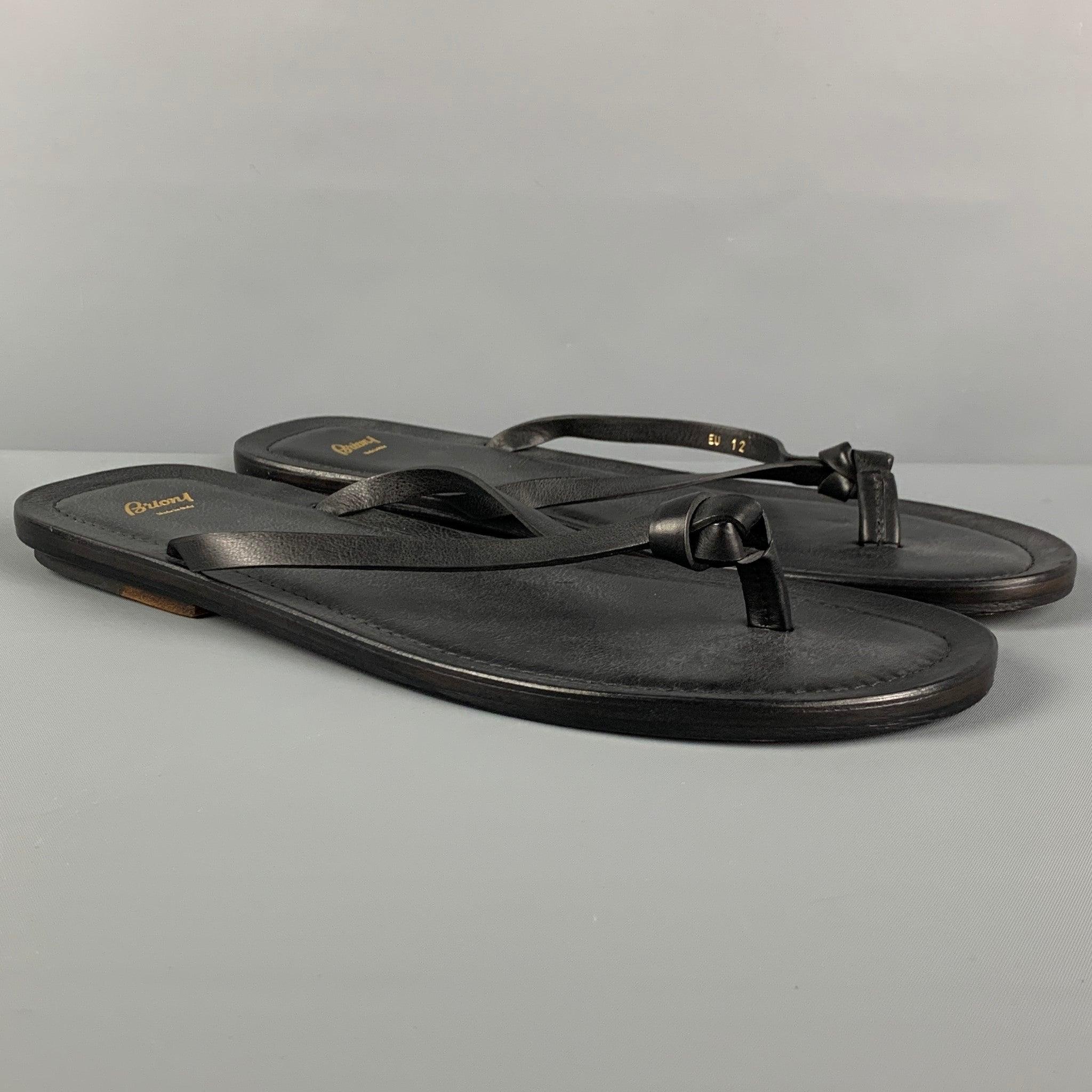 BRIONI sandals comes in a black leather featuring thong straps. Made in Italy.
New With Box.
 

Marked:   EU 12 / US 13Outsole: 12 inches  x 4.5 inches 
  
  
 
Reference: 117430
Category: Sandals
More Details
    
Brand:  BRIONI
Size:  13
Color: 