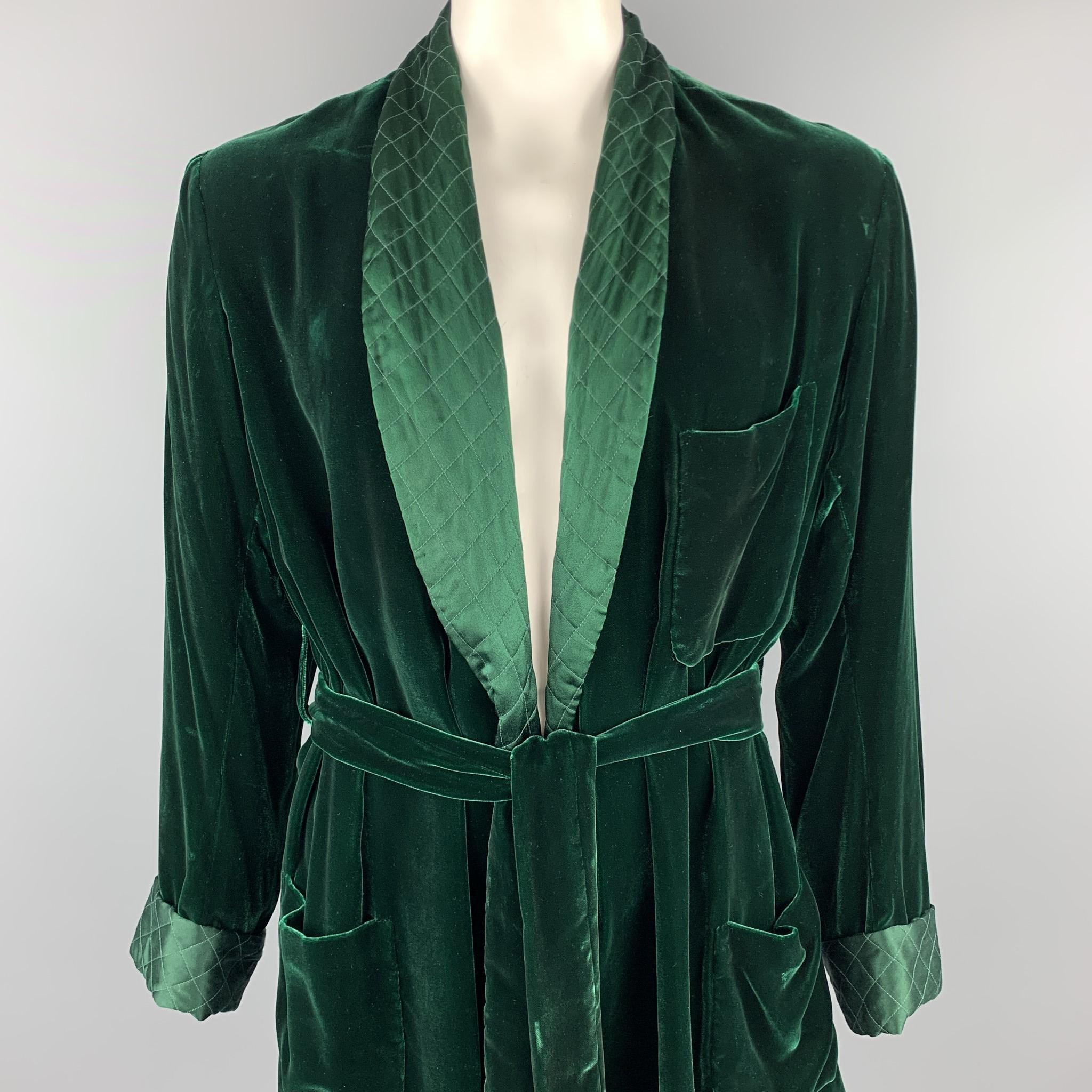 BRIONI jacket comes in a forest green silk velvet featuring a quilted shawl collar, front pockets, and a belted style.

Very Good Pre-Owned Condition.
Marked: No size marked

Measurements:

Shoulder: 17.5 in. 
Chest: 44 in. 
Sleeve: 25.5 in.