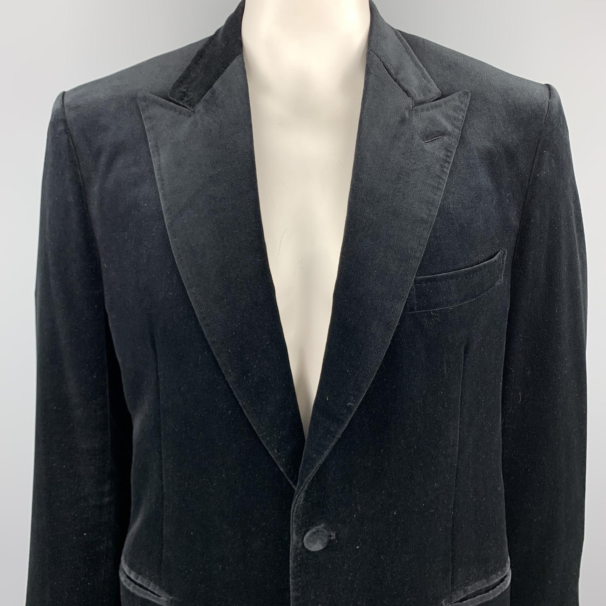 BRIONI sport coat comes in a black velvet featuring a peak lapel, slit pockets, and a single button closure. Made in Italy.

Excellent Pre-Owned Condition.
Marked: No Size Marked

Measurements:

Shoulder: 18 in. 
Chest: 42 in. 
Sleeve: 26