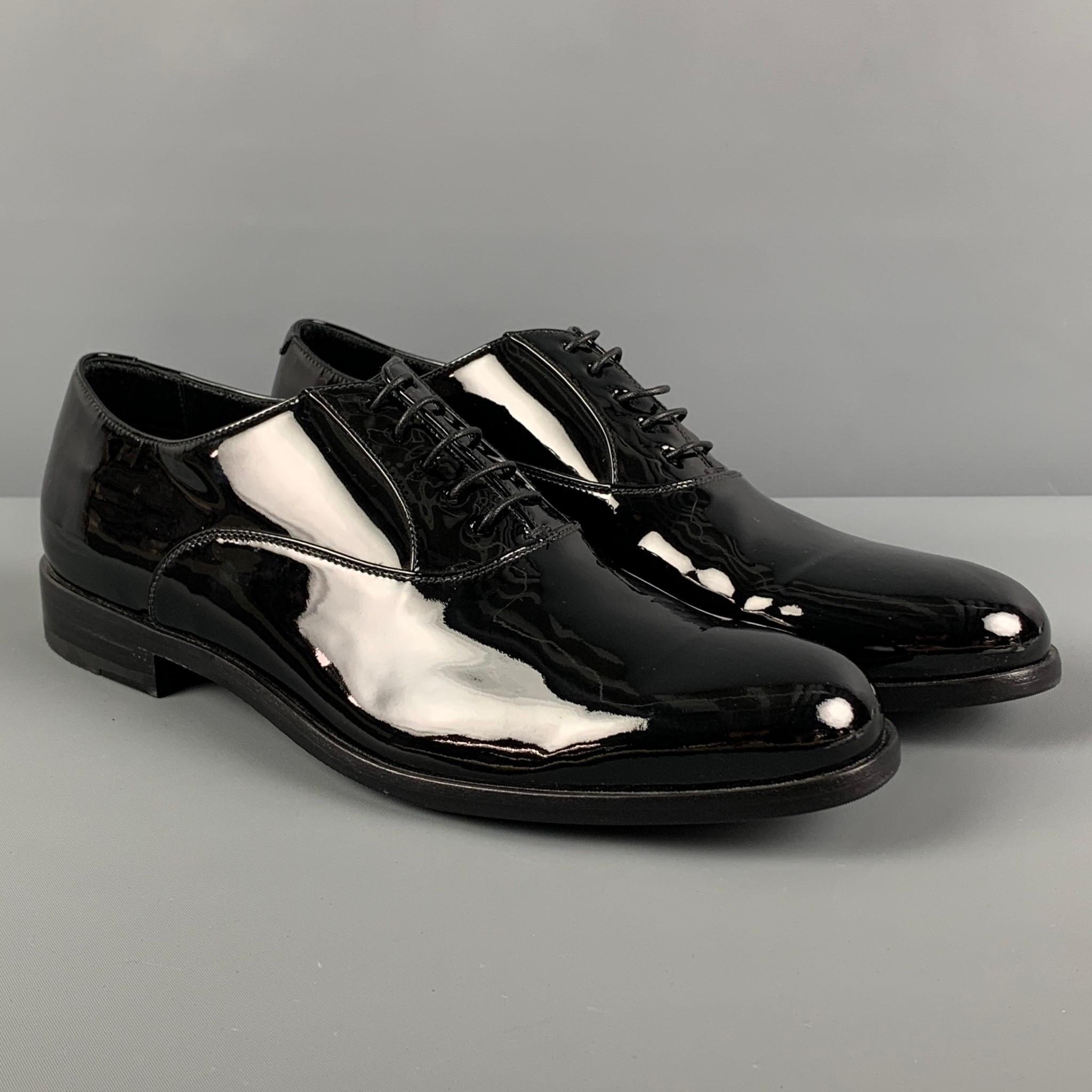 BRIONI shoes comes in a black patent leather featuring  classic style and a lace up closure. Includes box. Made in Italy.

Excellent Pre-Owned Condition.
Marked: EU 8 / US 9

Outsole: 12 in. x 4 in. 