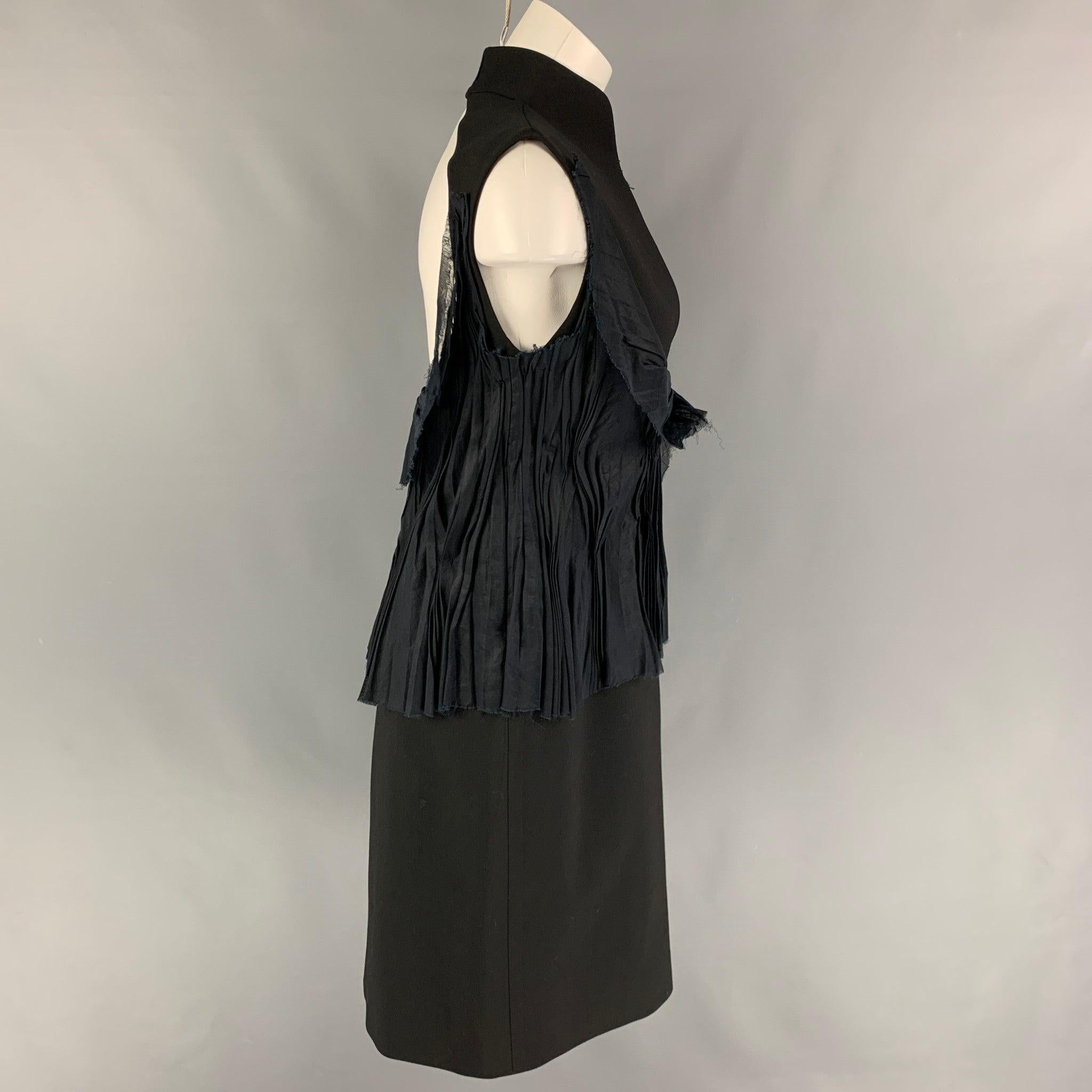 BRIONI dress comes in a black mercerized cotton featuring a high collar, ruffled panel design, sleeveless, open back, side zipper, and a hook & loop closure.Very Good
Pre-Owned Condition. Fabric tag removed. 

Marked:  Size tag removed.