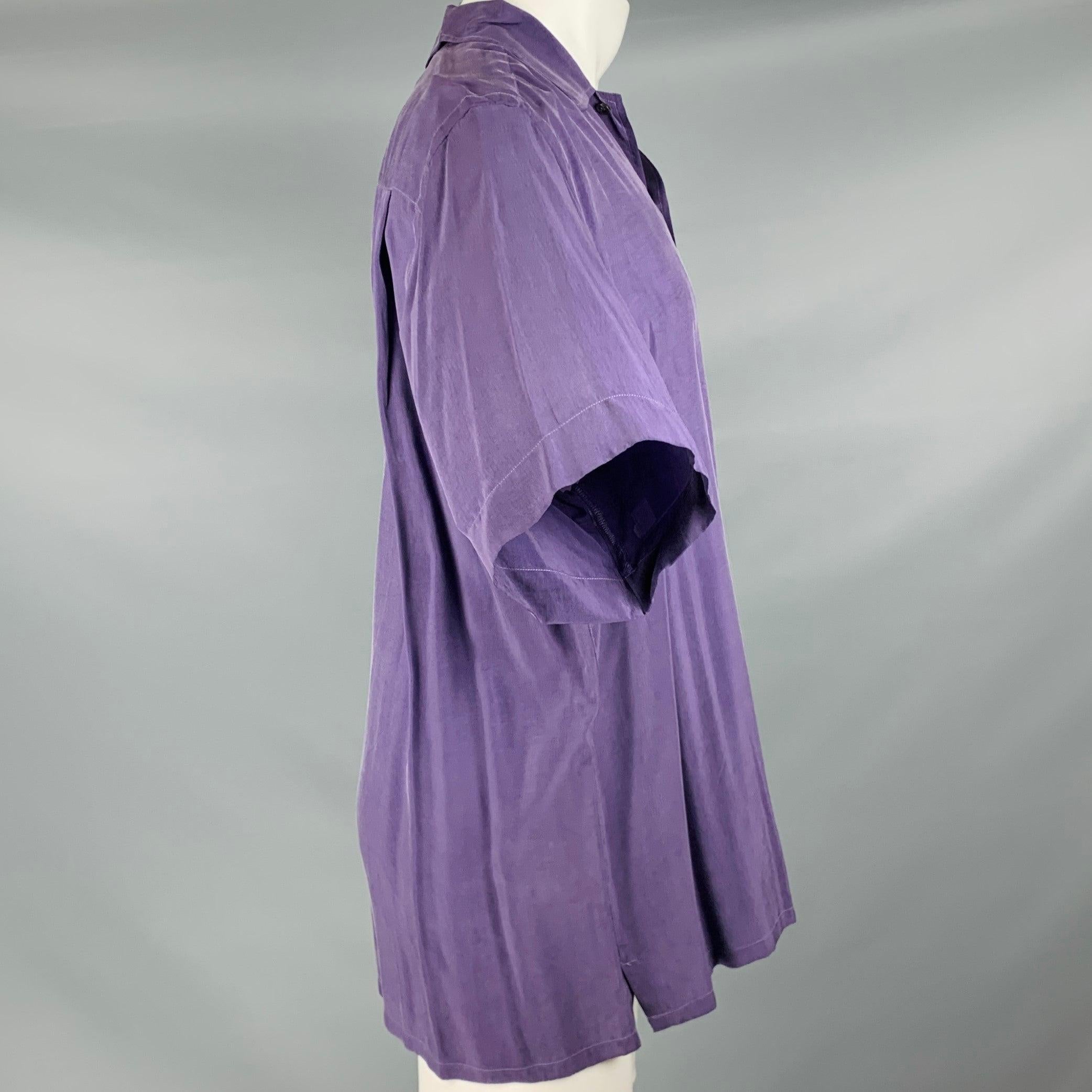 BRIONI short sleeve shirt
in a purple rayon fabric featuring one pocket and button closure. Made in Italy.Excellent Pre-Owned Condition. 

Marked:   M 

Measurements: 
 
Shoulder: 18.5 inches Chest: 46 inches Sleeve: 10 inches Length: 30.5 inches 
 